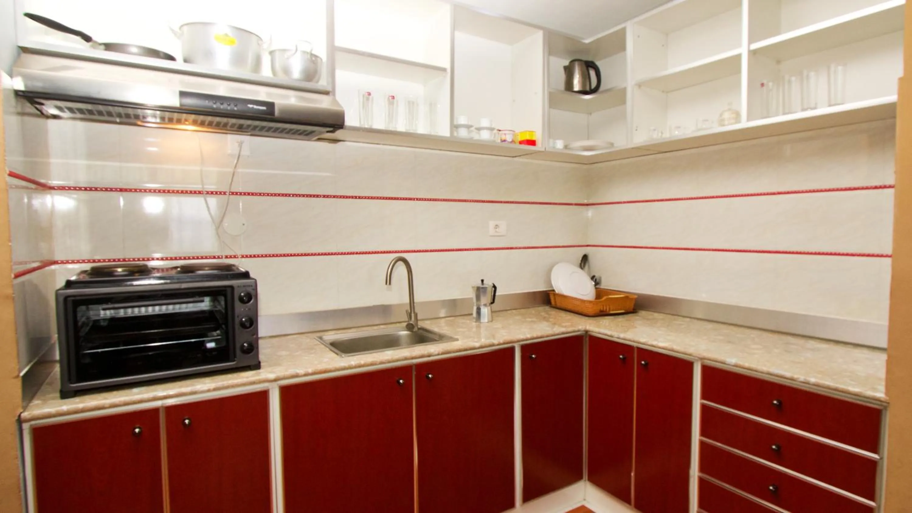 Kitchen or kitchenette in Yinm Furnished Apartment