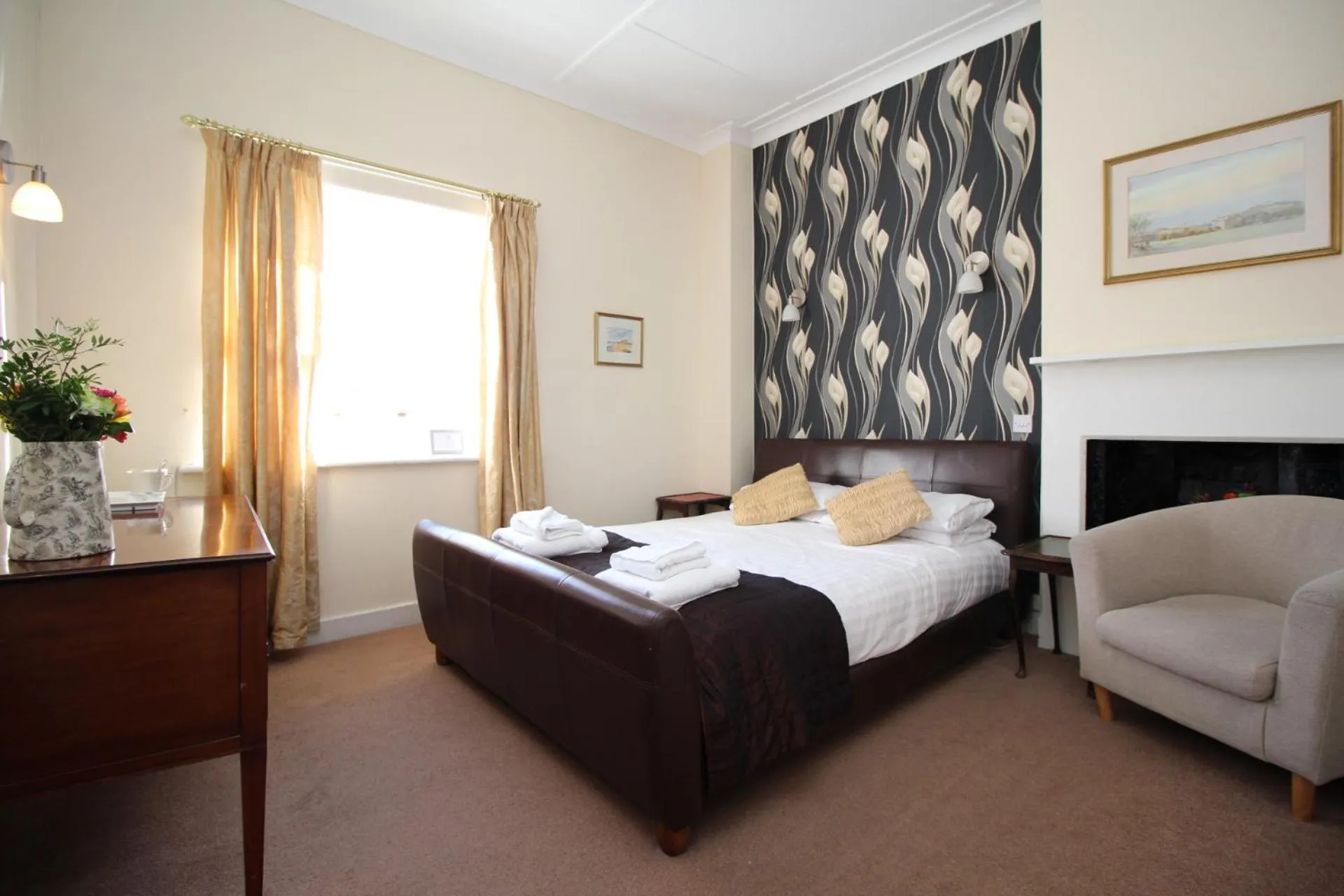 Bed in Blue Bell Hotel