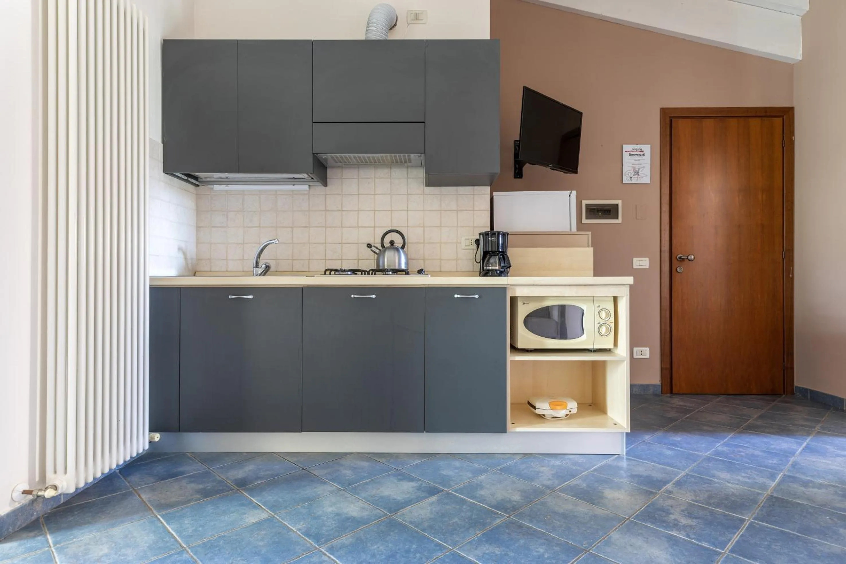 Kitchen or kitchenette in Residence Il Melograno