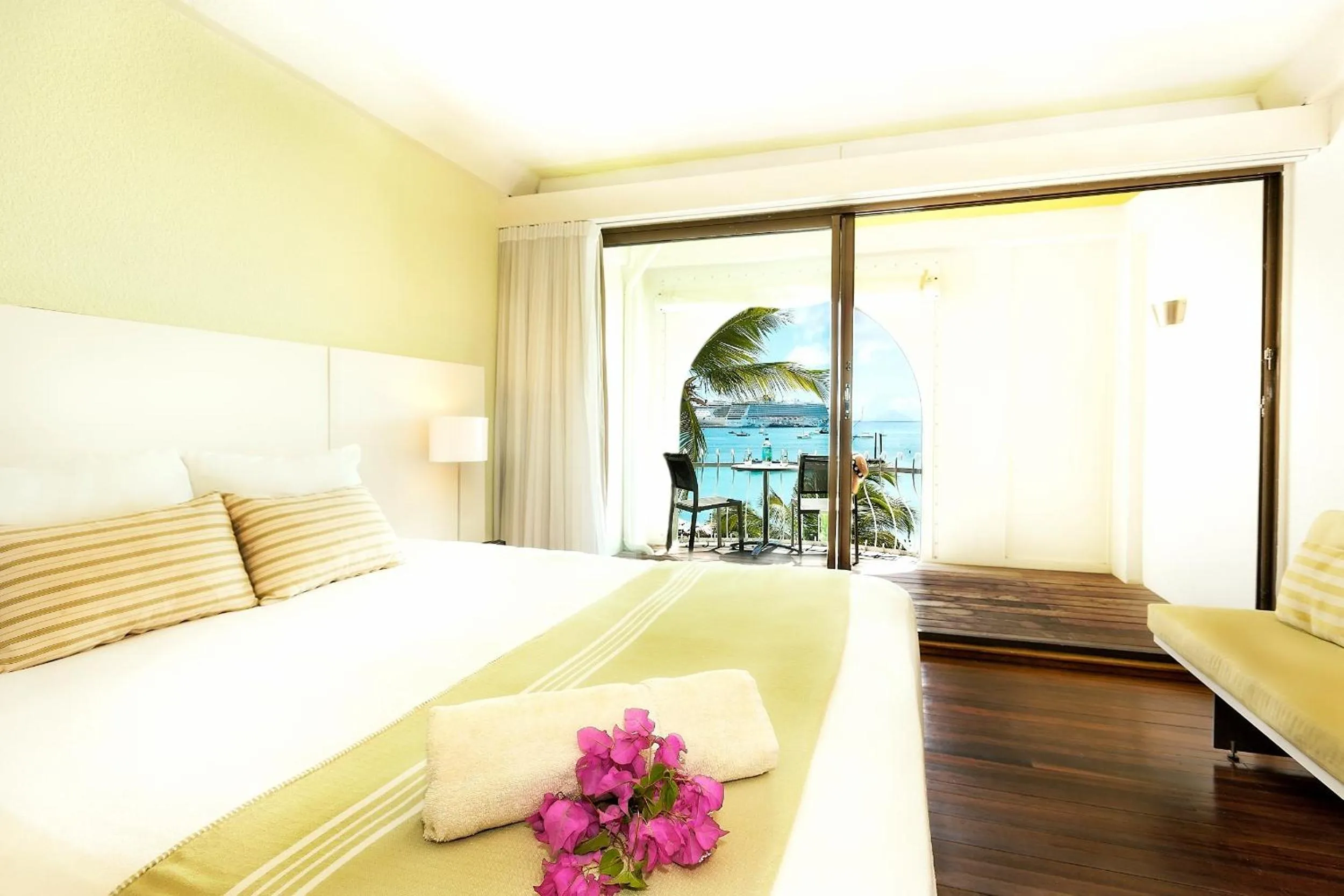 Bed in Holland House Beach Hotel