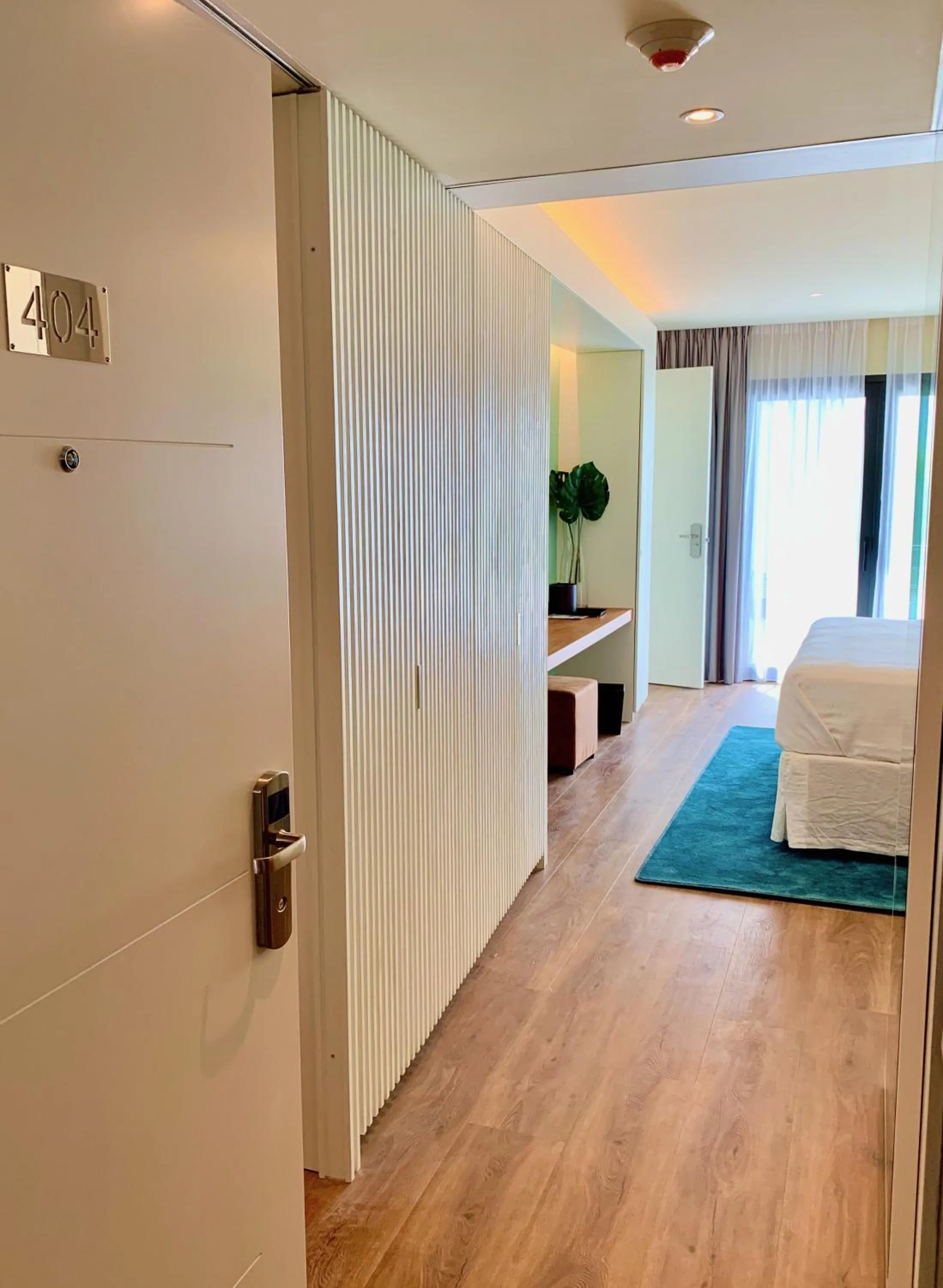 Bed in Holland House Beach Hotel