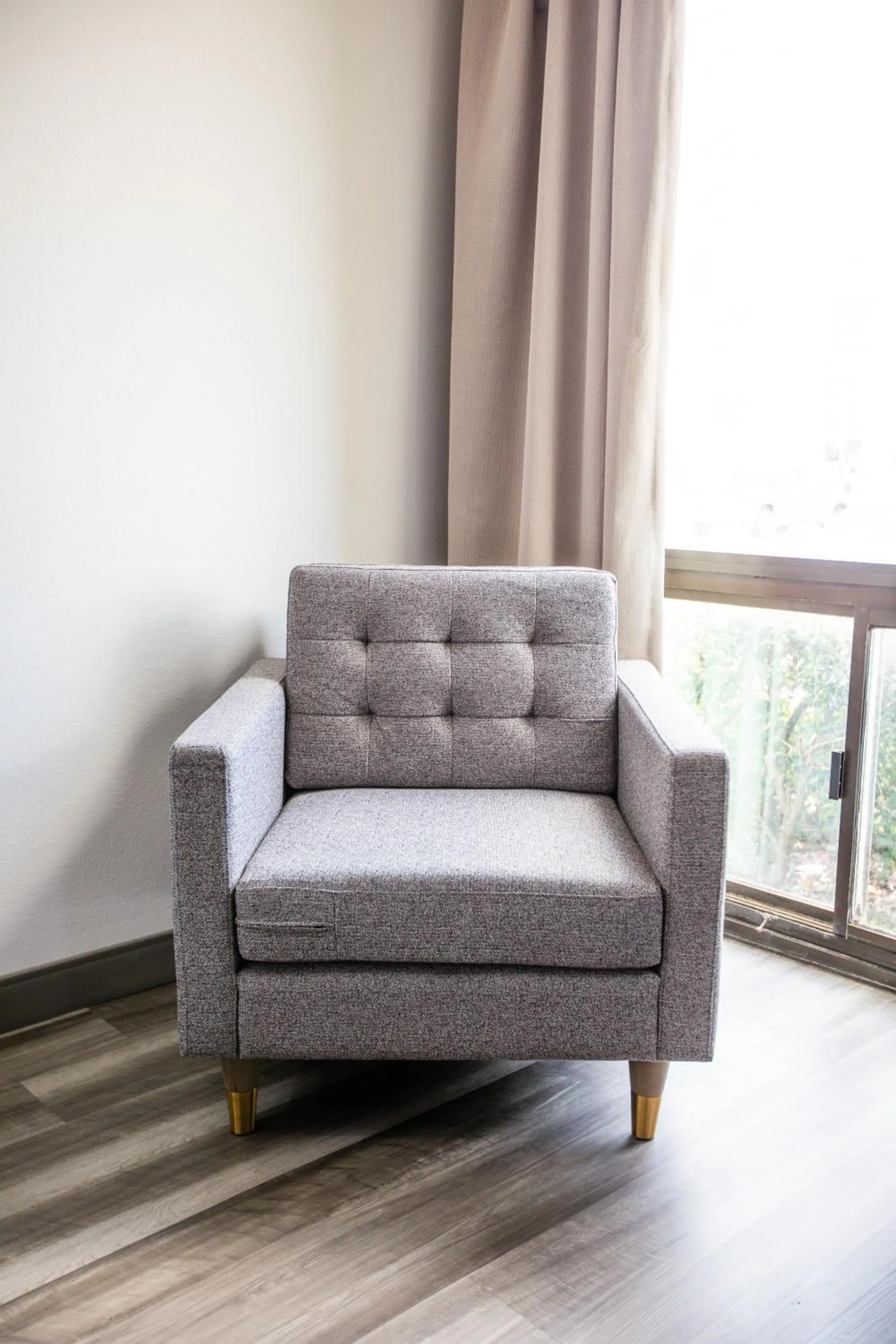 Seating area in La Quinta by Wyndham Dallas I-35 Walnut Hill Ln