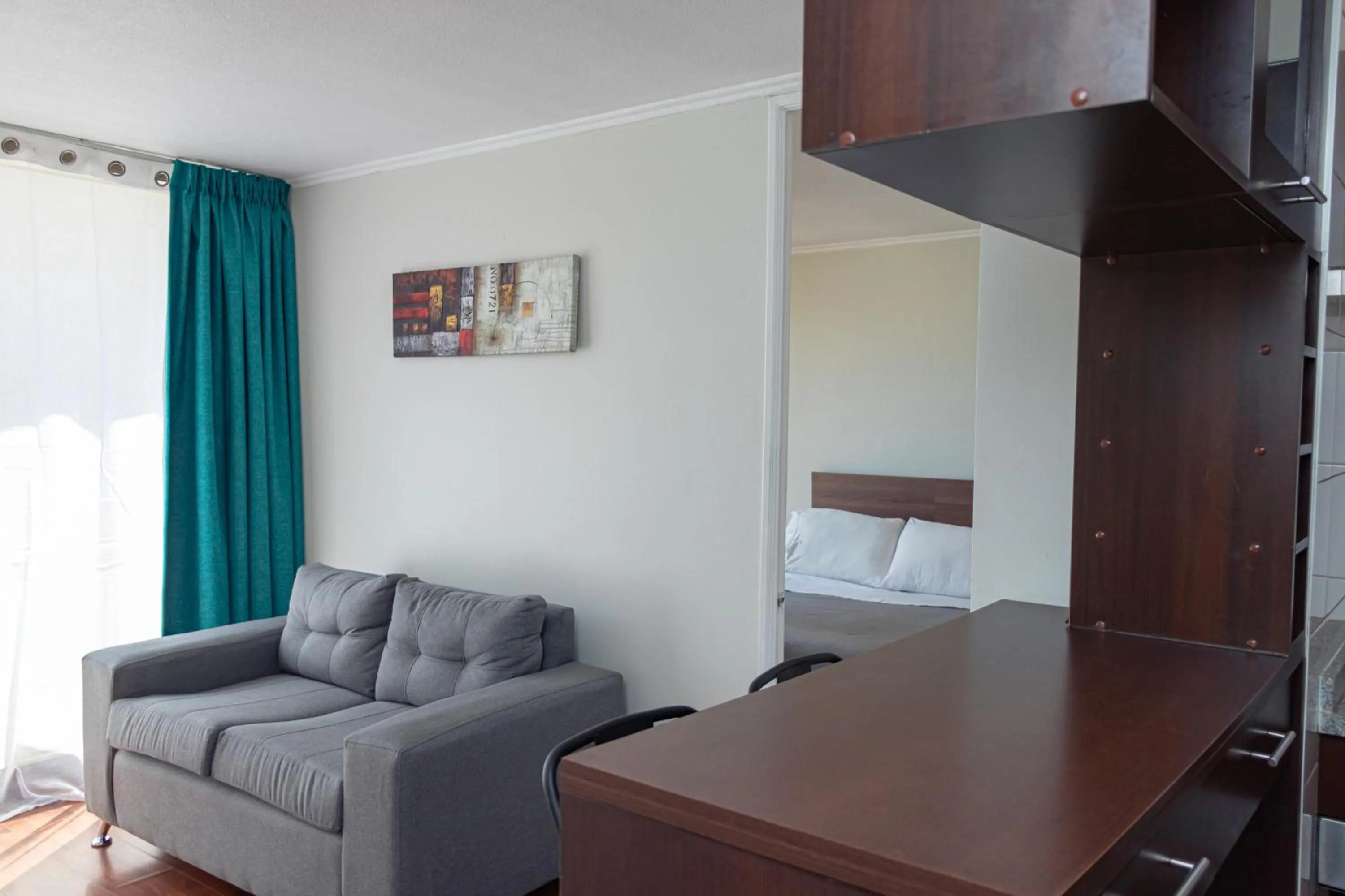 Living room, Bed in Departamentos Amoblados Torre Tagle