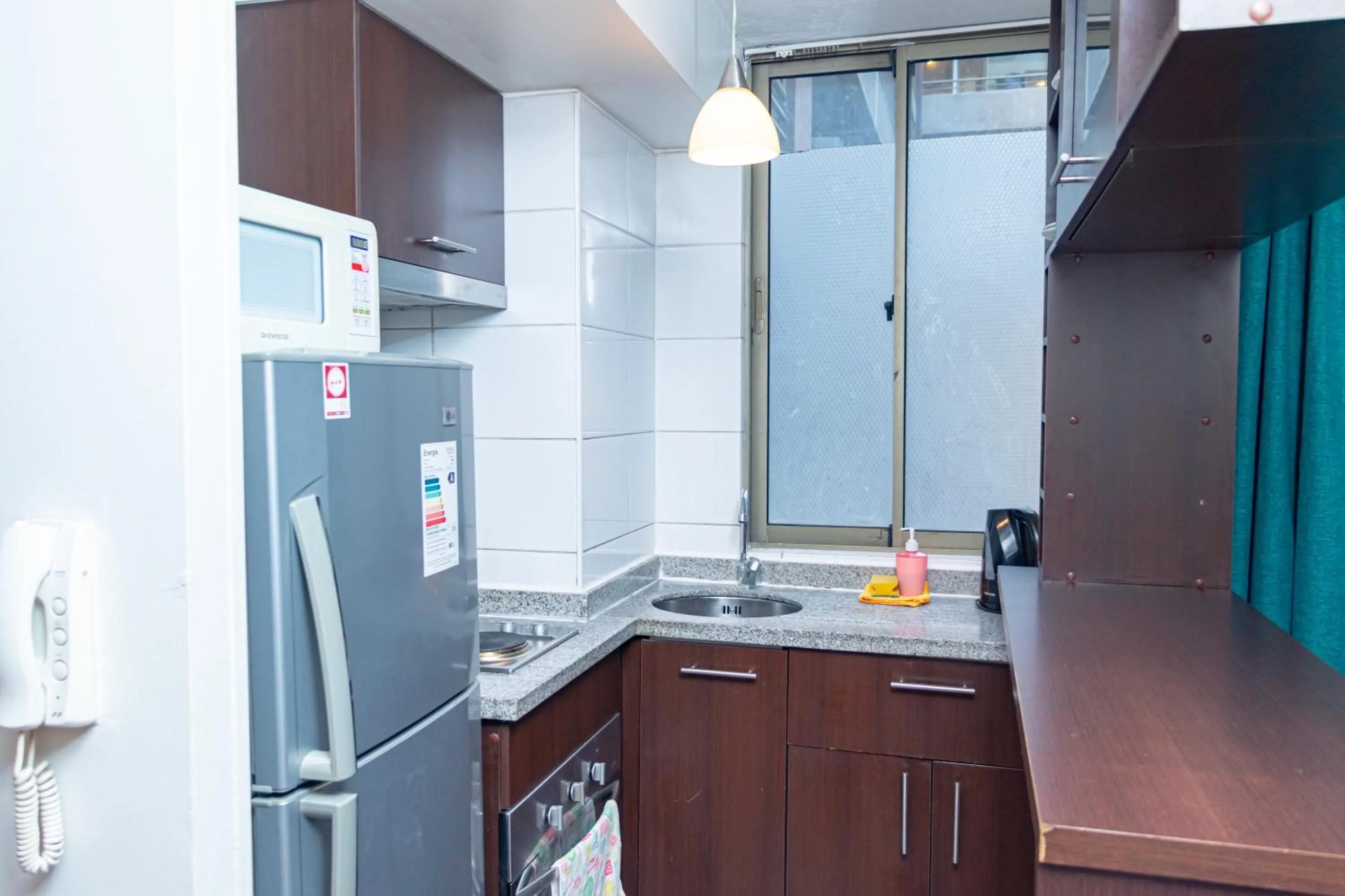 Kitchen or kitchenette in Departamentos Amoblados Torre Tagle