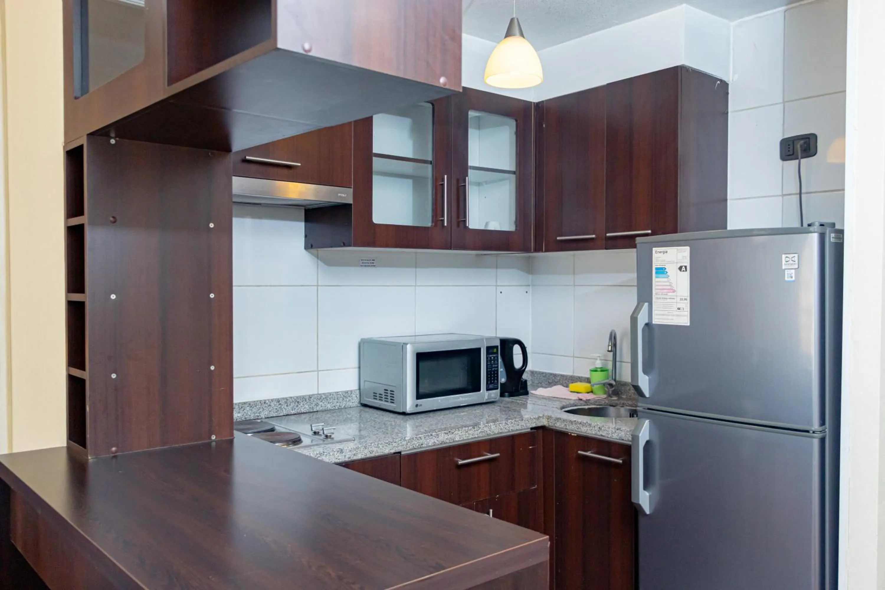 Kitchen or kitchenette in Departamentos Amoblados Torre Tagle
