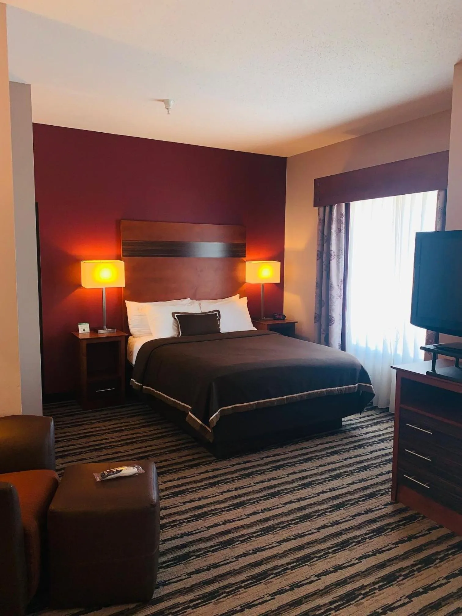 Bed in GrandStay Residential Suites Hotel