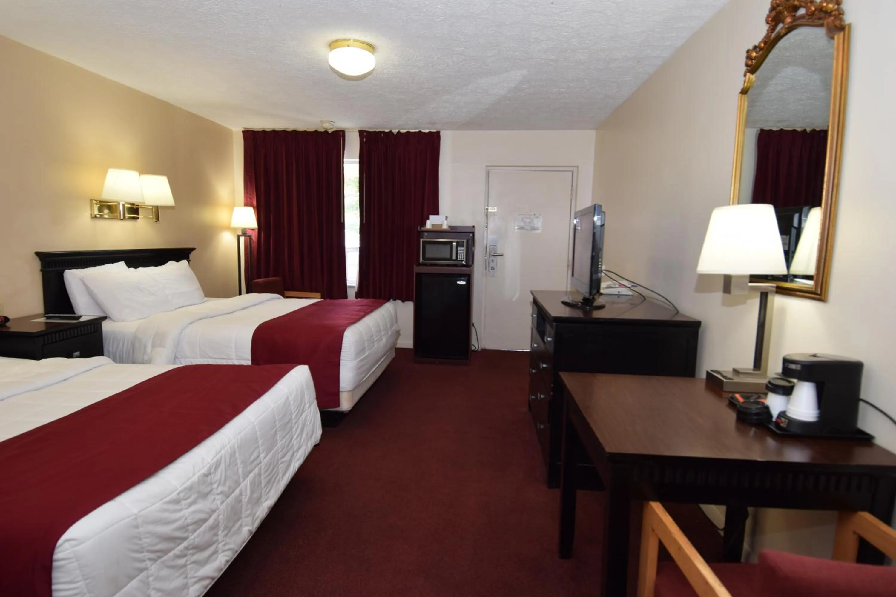 Bed in Knights Inn Oswego East