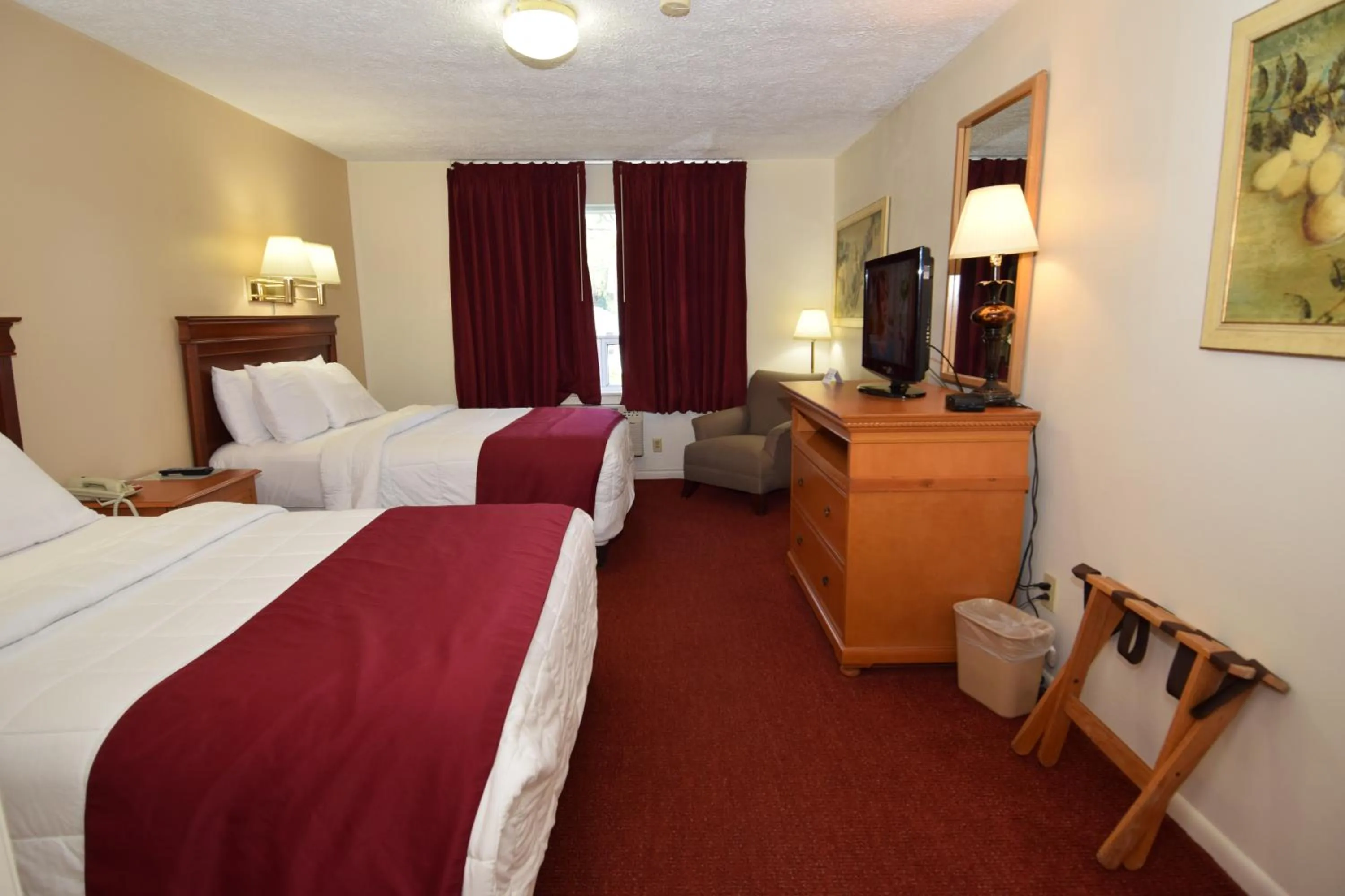 Bed in Knights Inn Oswego East