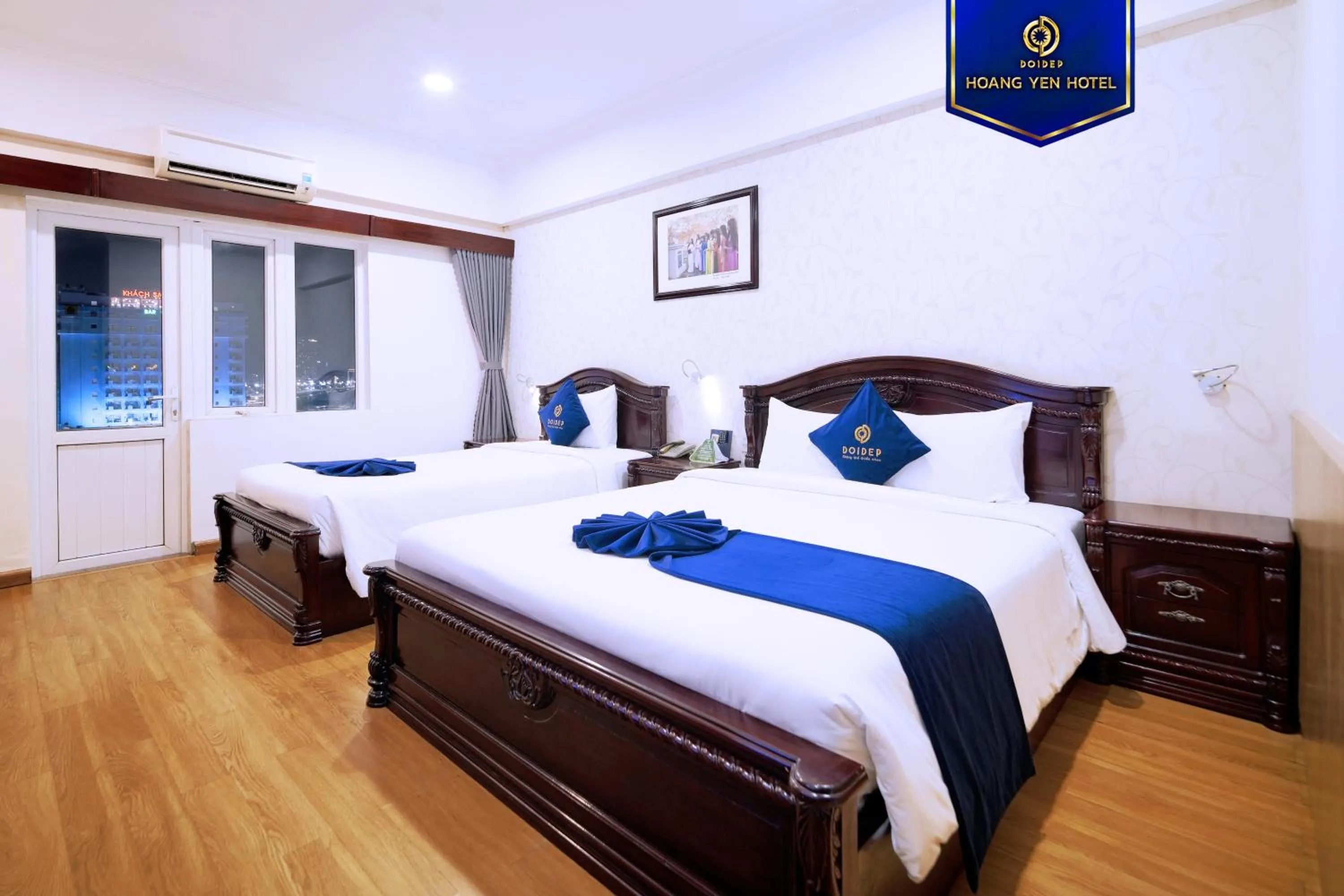 Photo of the whole room, Bed in Sandals Hoàng Yến