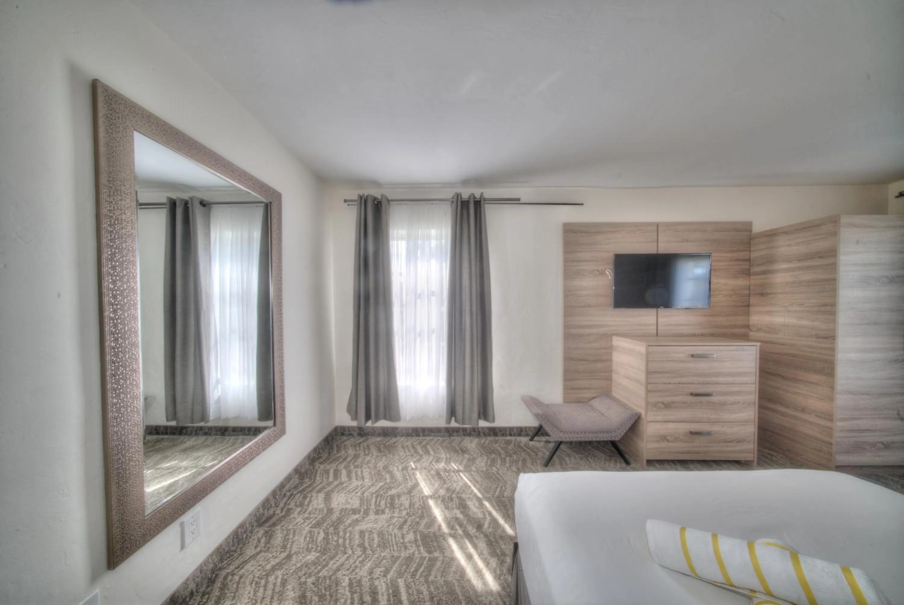 Bed in Riverside by the Beach Apartments