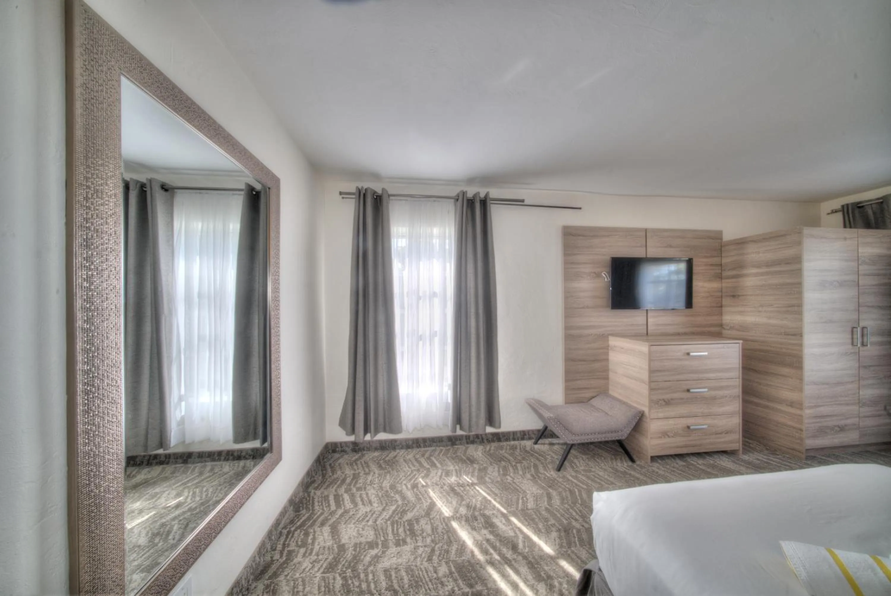 Bed in Riverside by the Beach Apartments