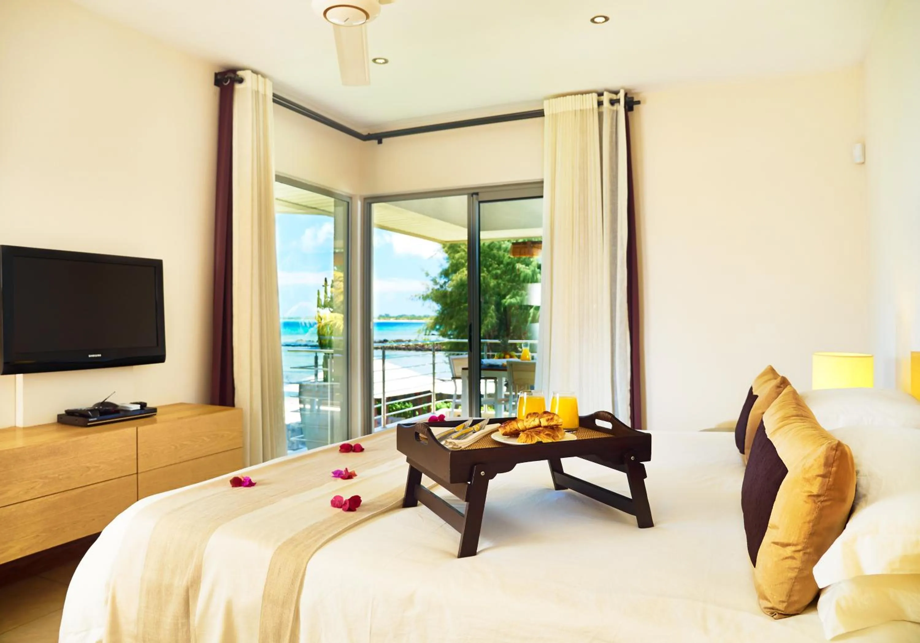 Bed in Bon Azur Beachfront Suites & Penthouses by LOV Mauritius