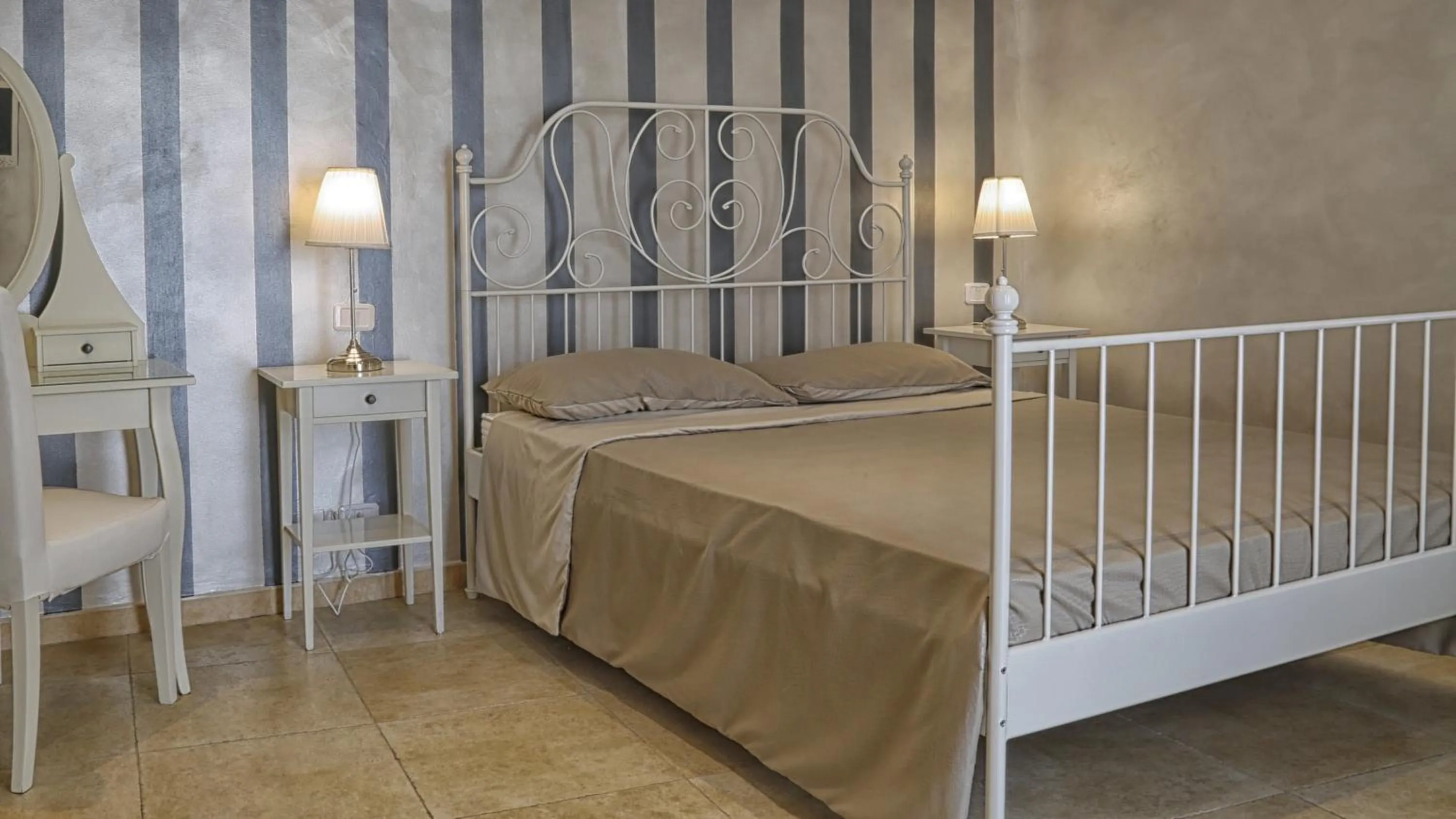 Bed in Relais La Pretura