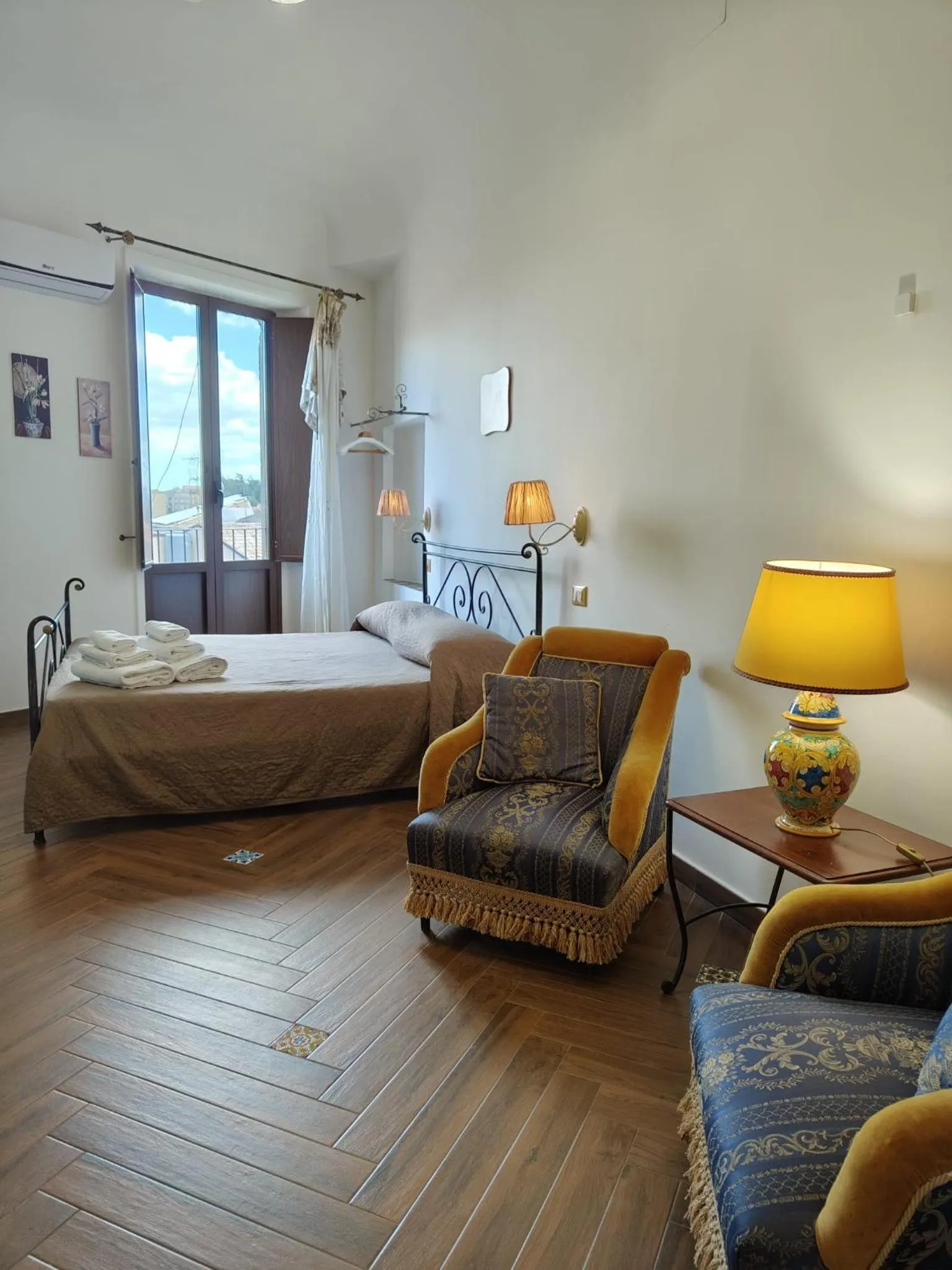 Bed in Centro Sicilia Rooms & Suites