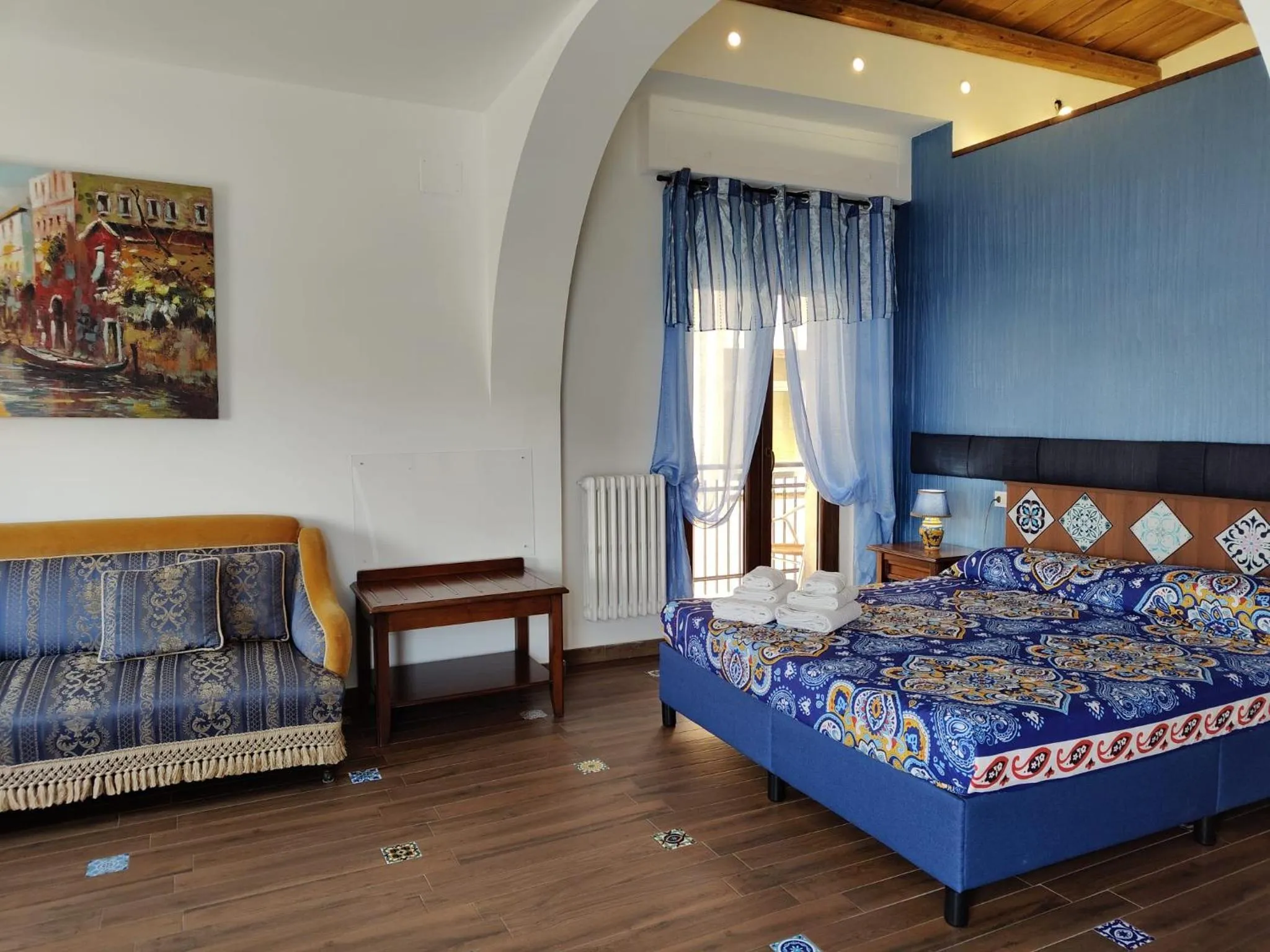 Bed in Centro Sicilia Rooms & Suites