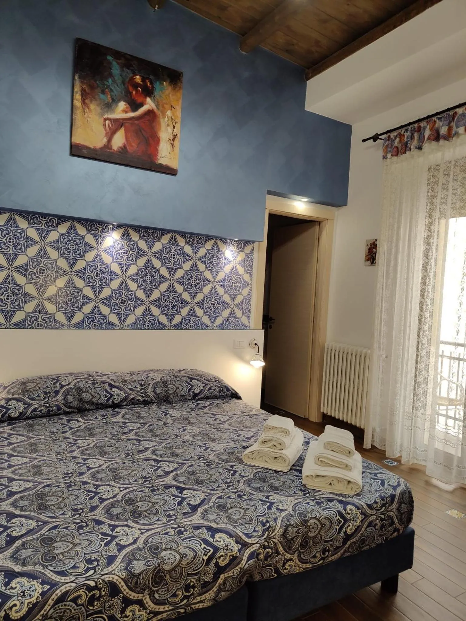 Bed in Centro Sicilia Rooms & Suites