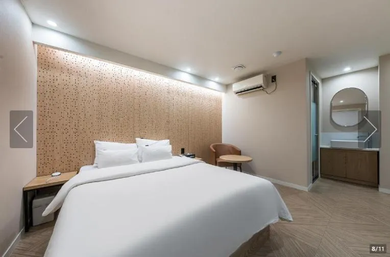 Bed in Jamsil Tomgi Hotel