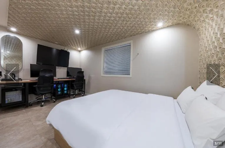 Bed in Jamsil Tomgi Hotel