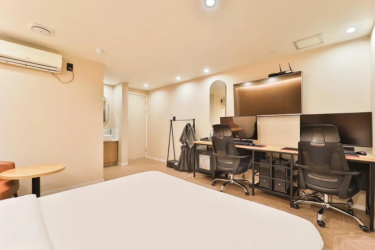 Bed in Jamsil Tomgi Hotel