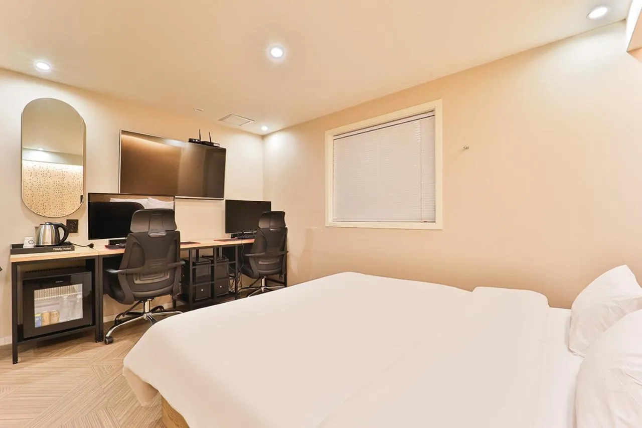 Bed in Jamsil Tomgi Hotel