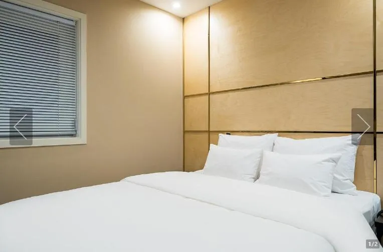 Bed in Jamsil Tomgi Hotel