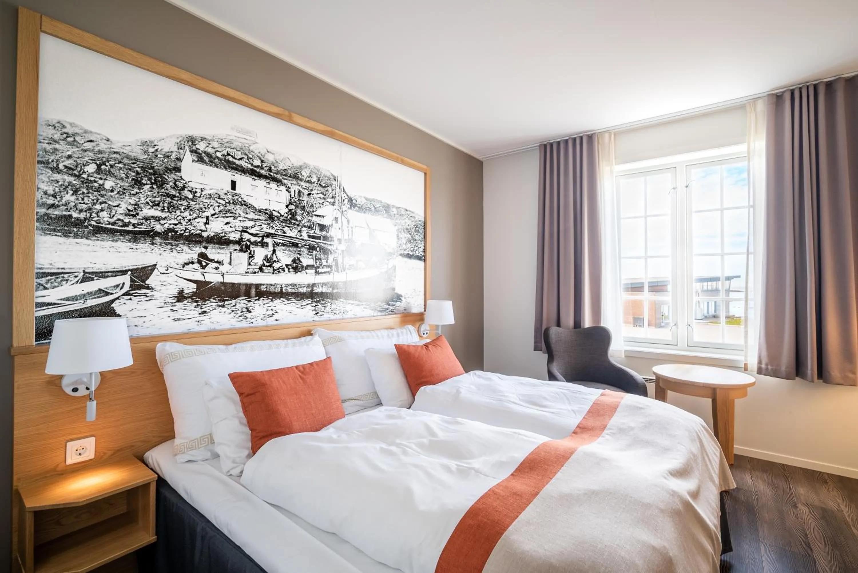 Bed in Finnøy Bryggehotell - by Classic Norway Hotels