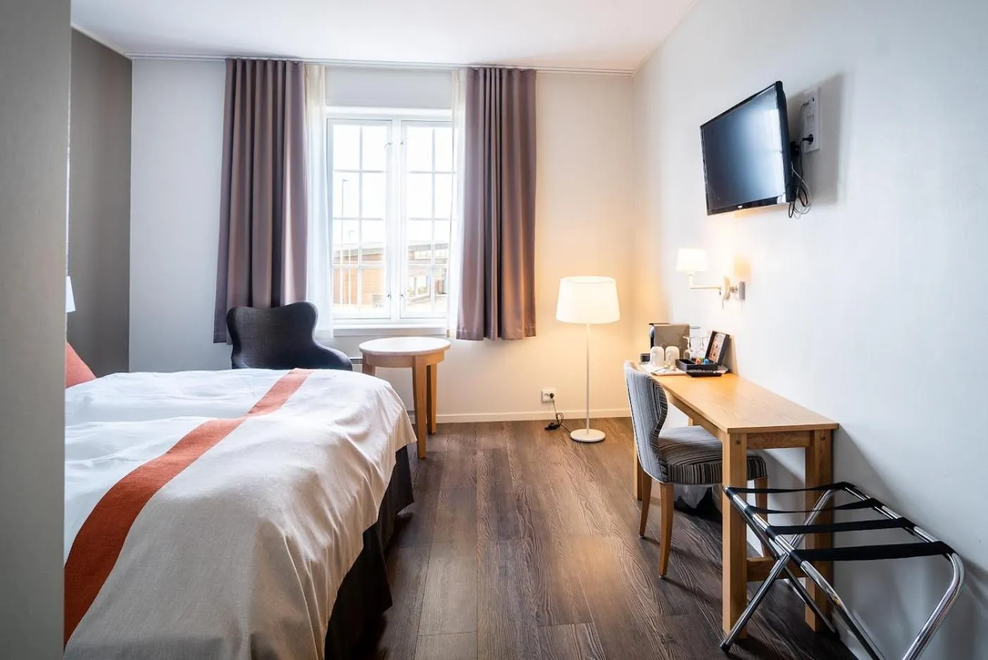 Bedroom, Bed in Finnøy Bryggehotell - by Classic Norway Hotels