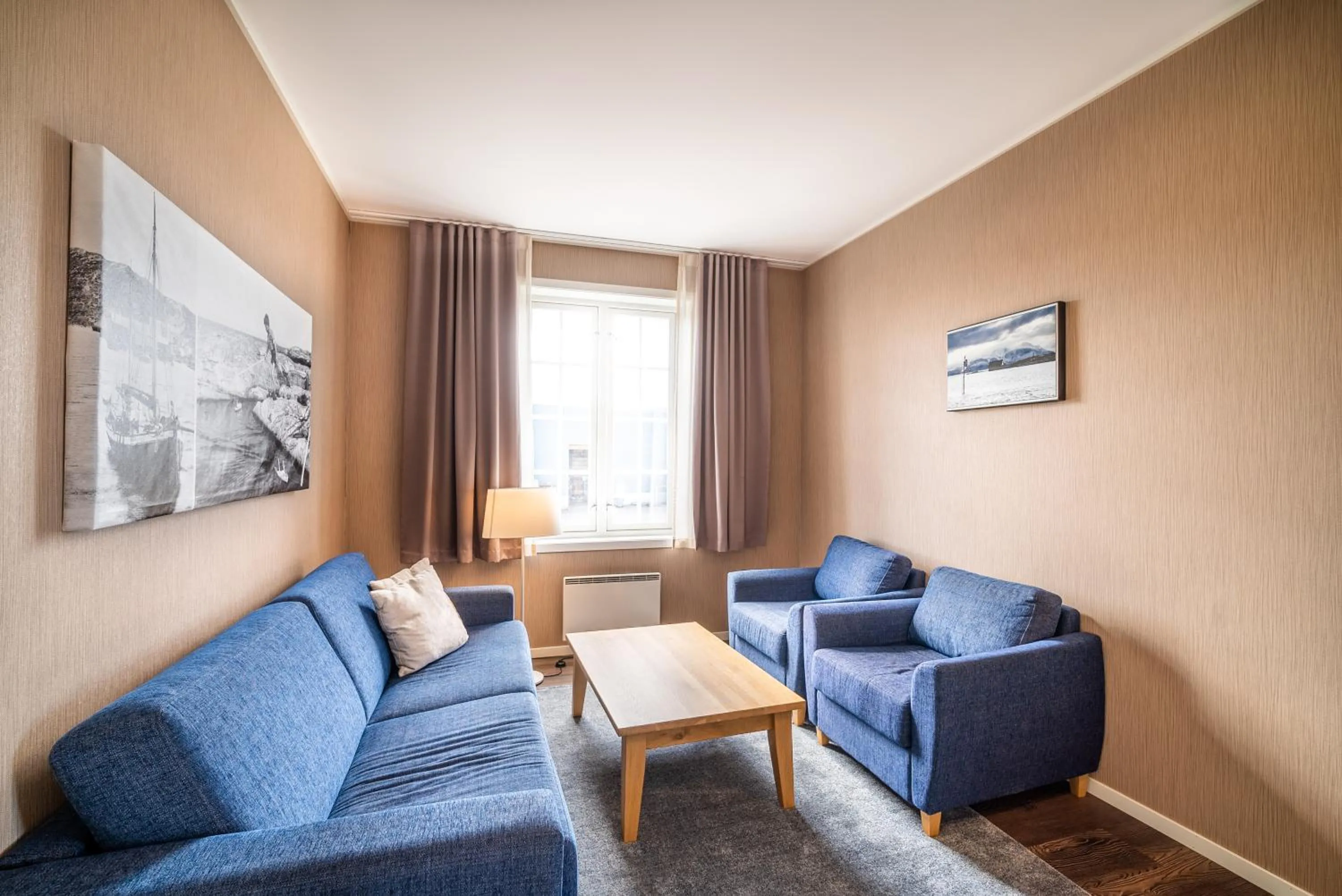 Seating area in Finnøy Bryggehotell - by Classic Norway Hotels