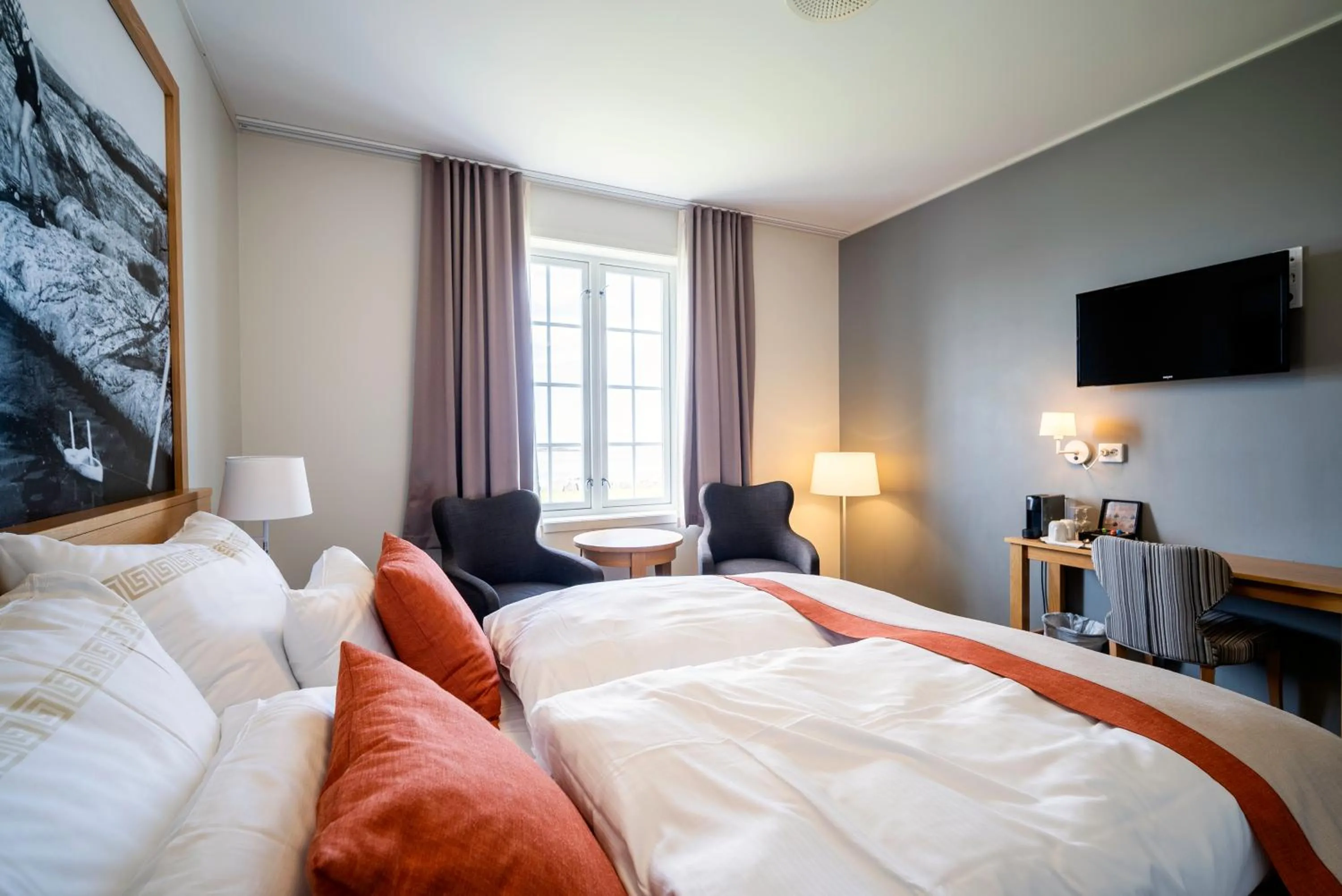 Photo of the whole room, Bed in Finnøy Bryggehotell - by Classic Norway Hotels