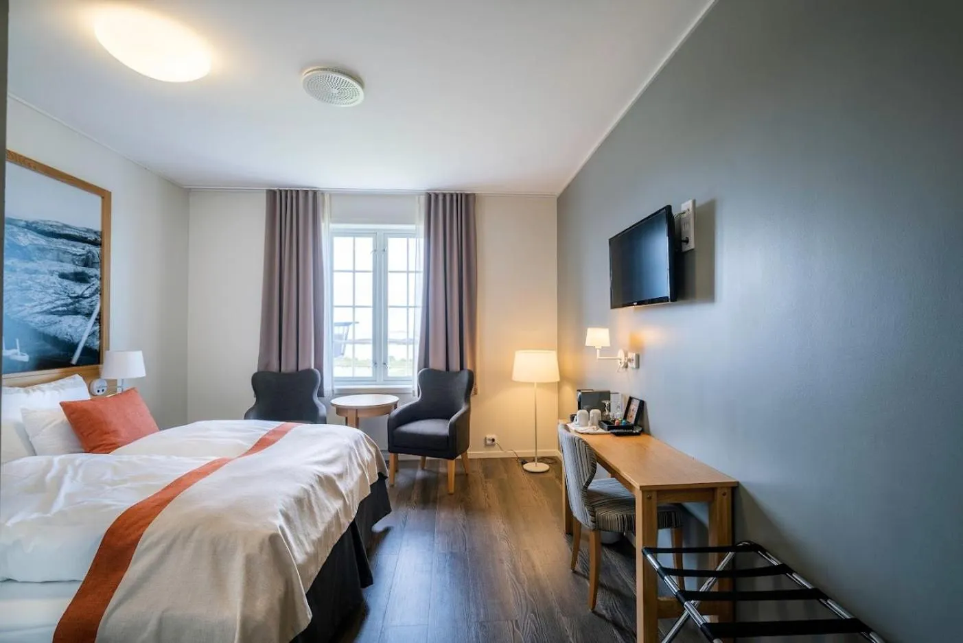 Bedroom, Bed in Finnøy Bryggehotell - by Classic Norway Hotels