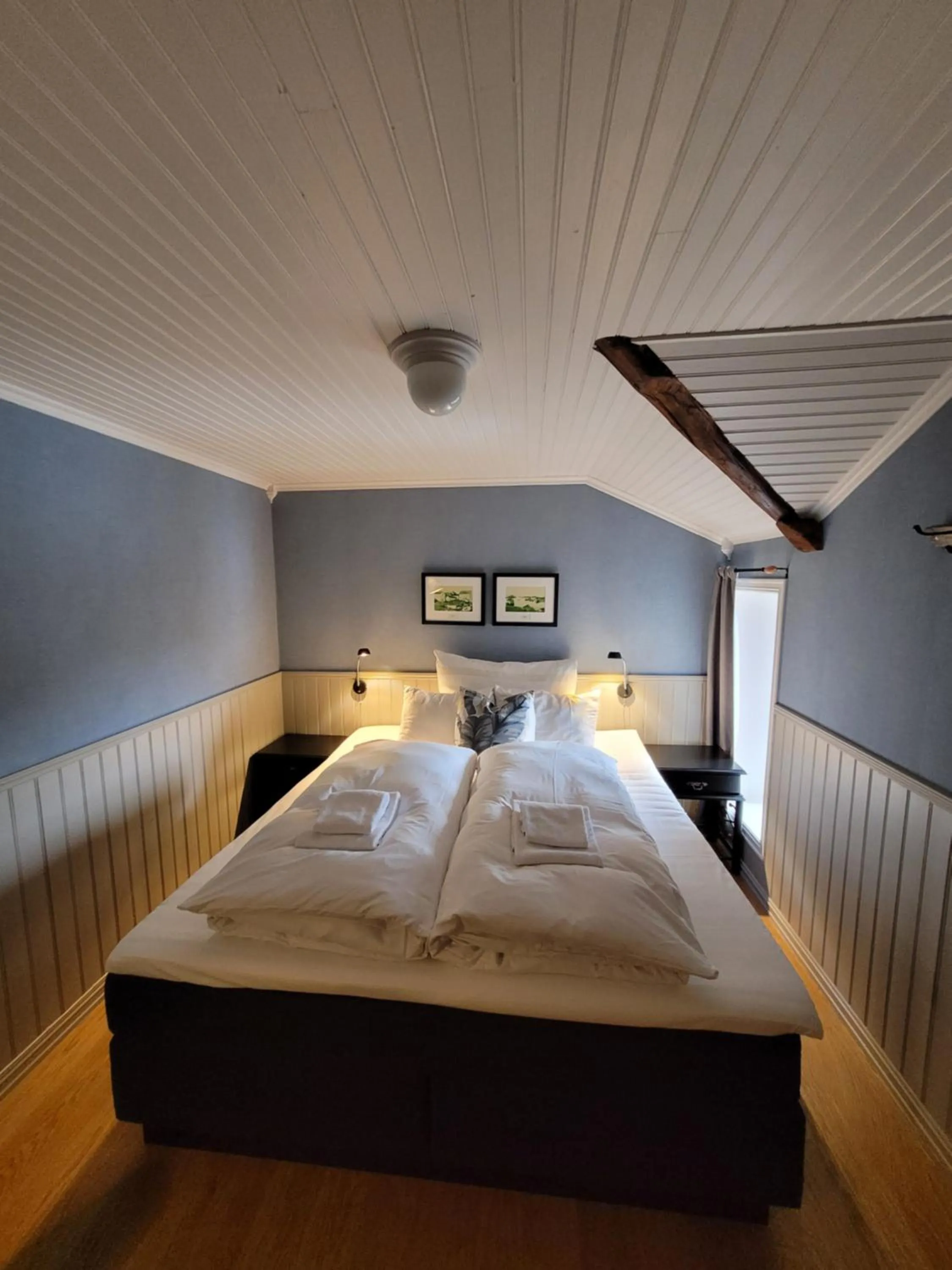 Bedroom, Bed in Ona Havstuer - by Classic Norway Hotels