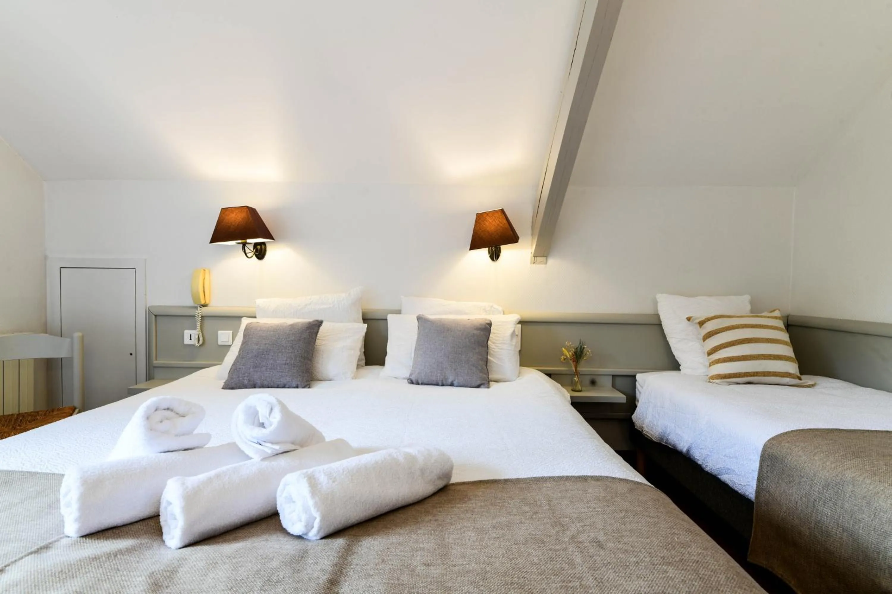 Bed in Logis Hôtel Etchemaïté