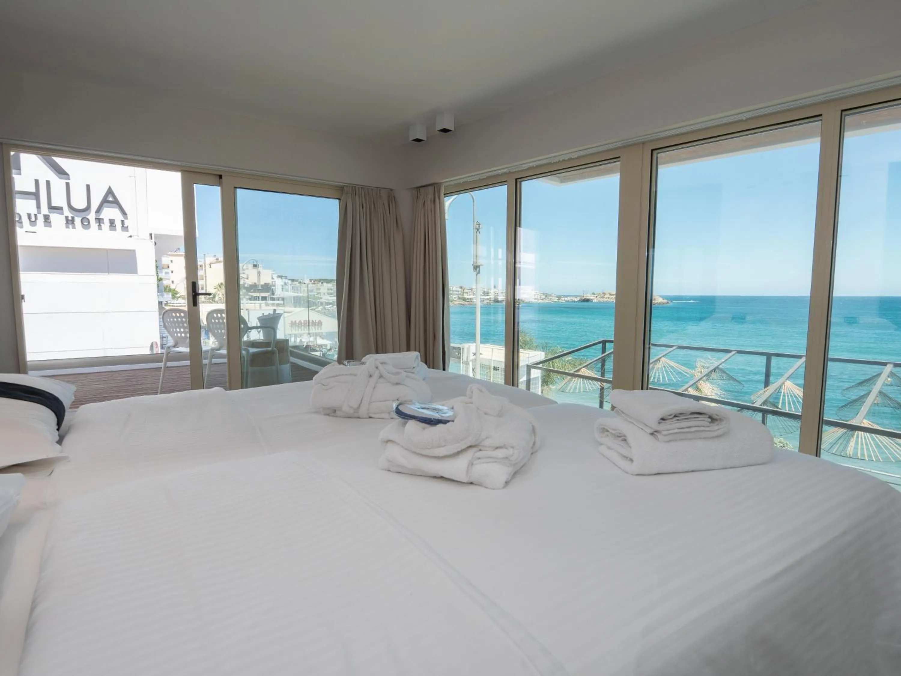 Bedroom, Bed in Kahlua Sea View Suites - Adults Only