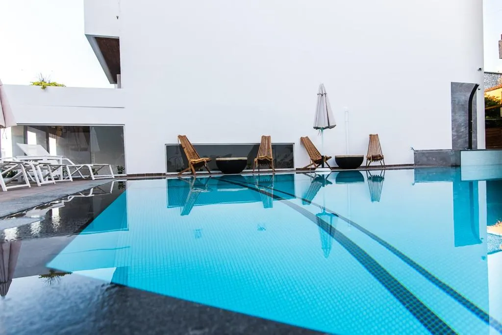 Swimming pool in Kahlua Sea View Suites - Adults Only