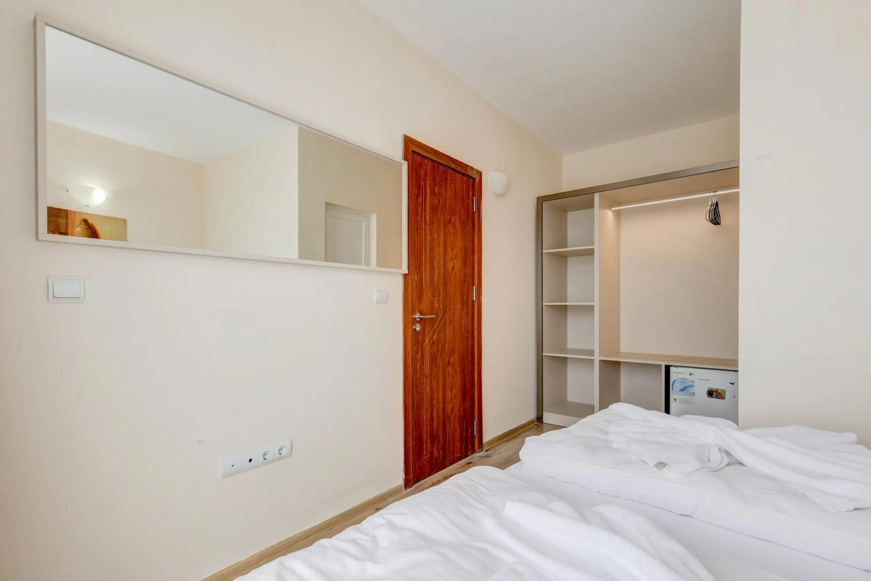 Bed in Jupiter 1 Family Hotel