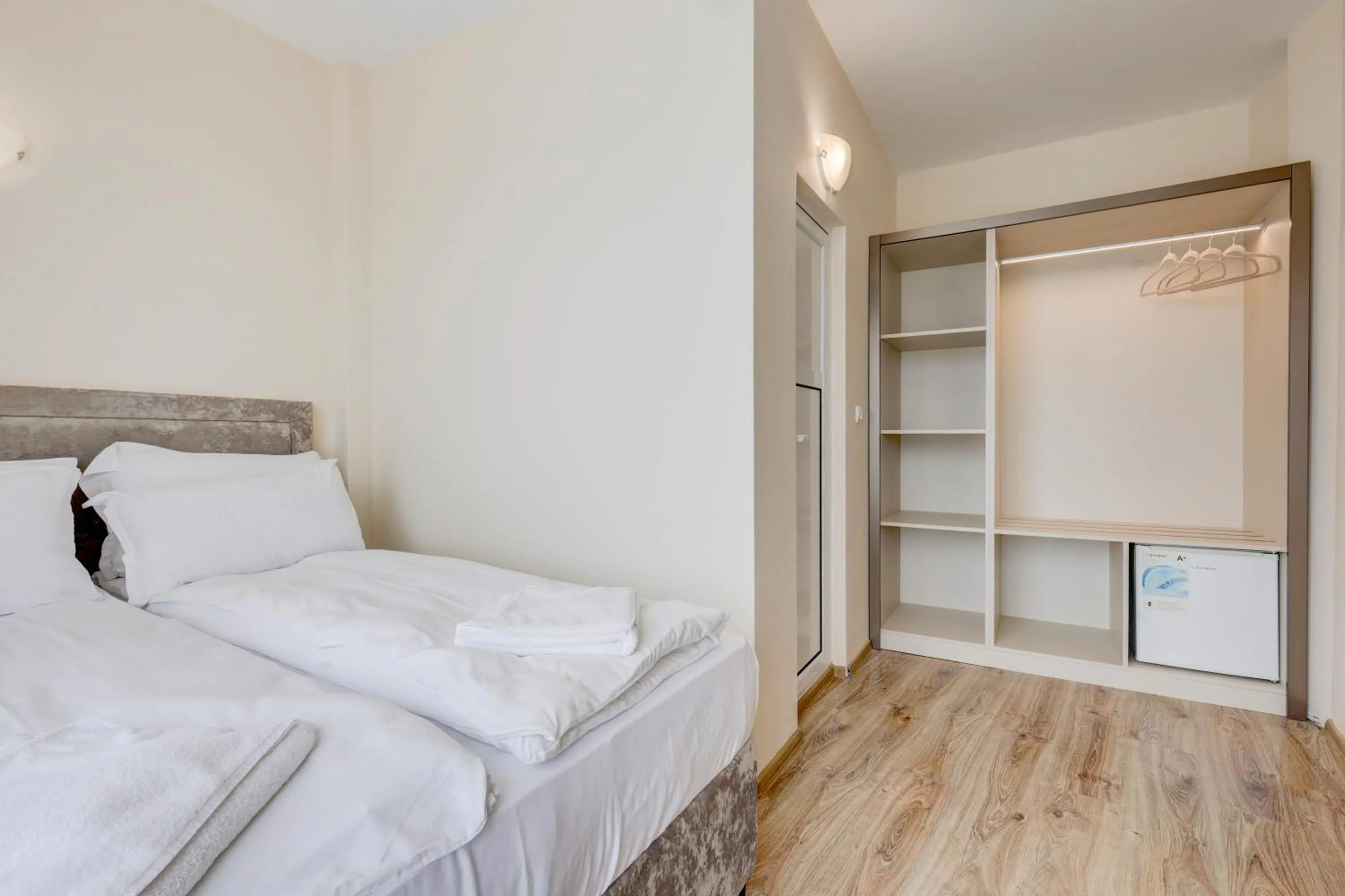 Bed in Jupiter 1 Family Hotel