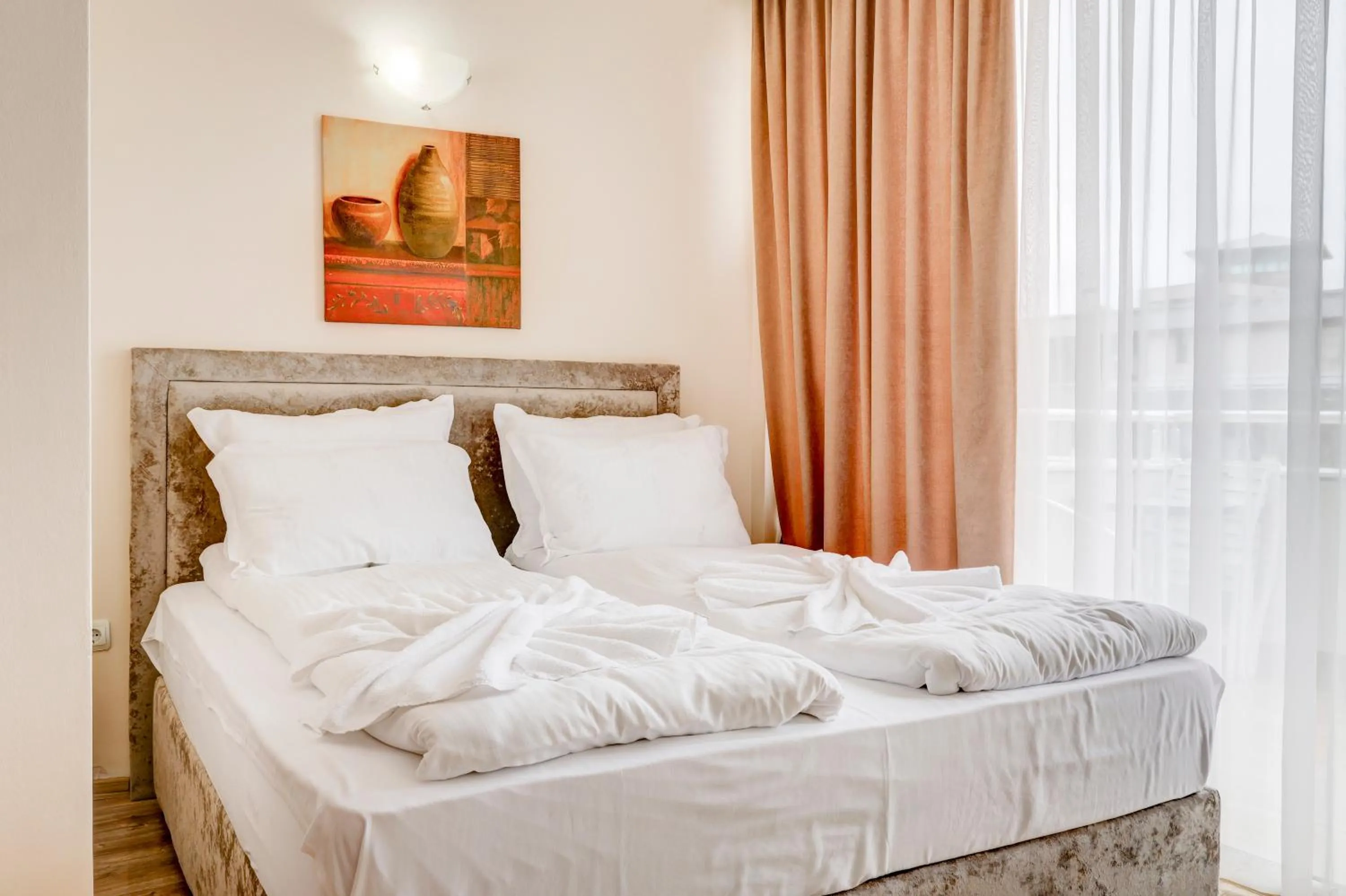 Bed in Jupiter 1 Family Hotel