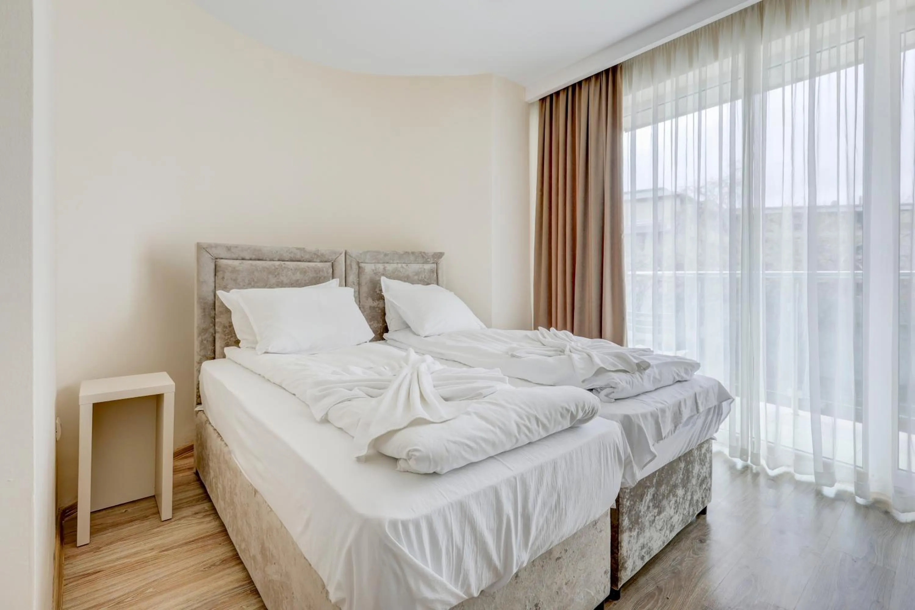 Bed in Jupiter 1 Family Hotel