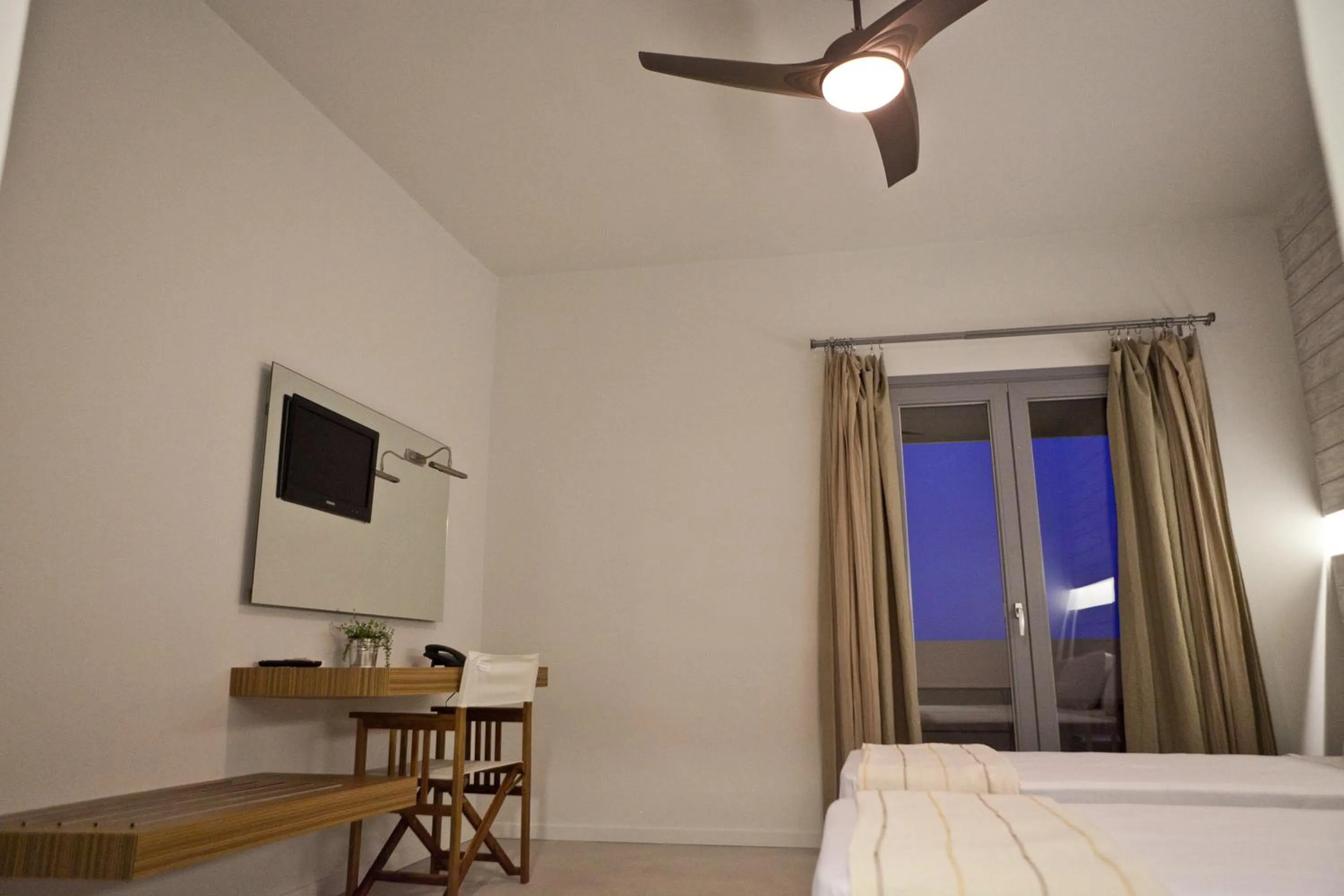 Bed in Xanthippi Hotel