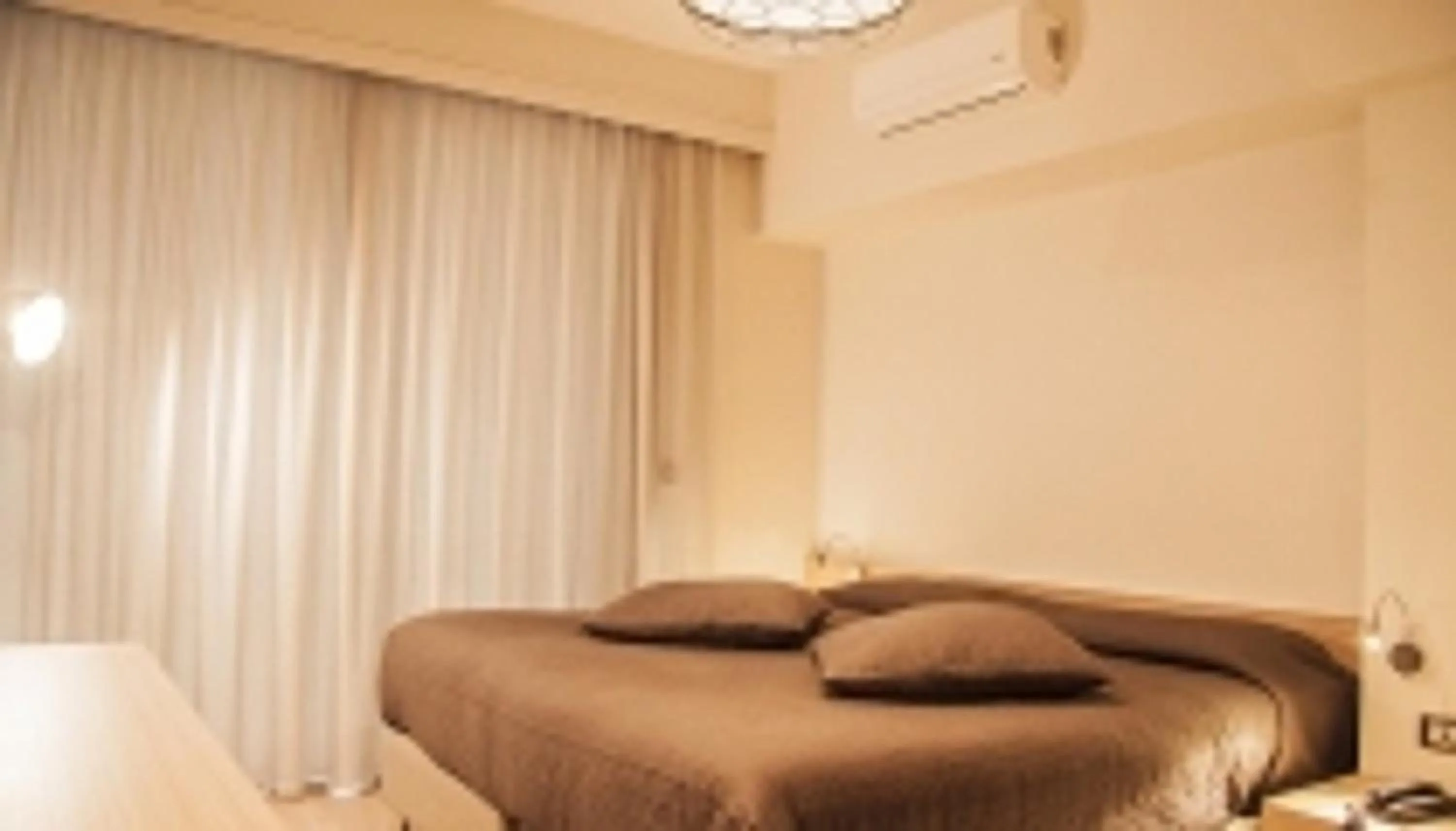 Bed in Hotel Christina