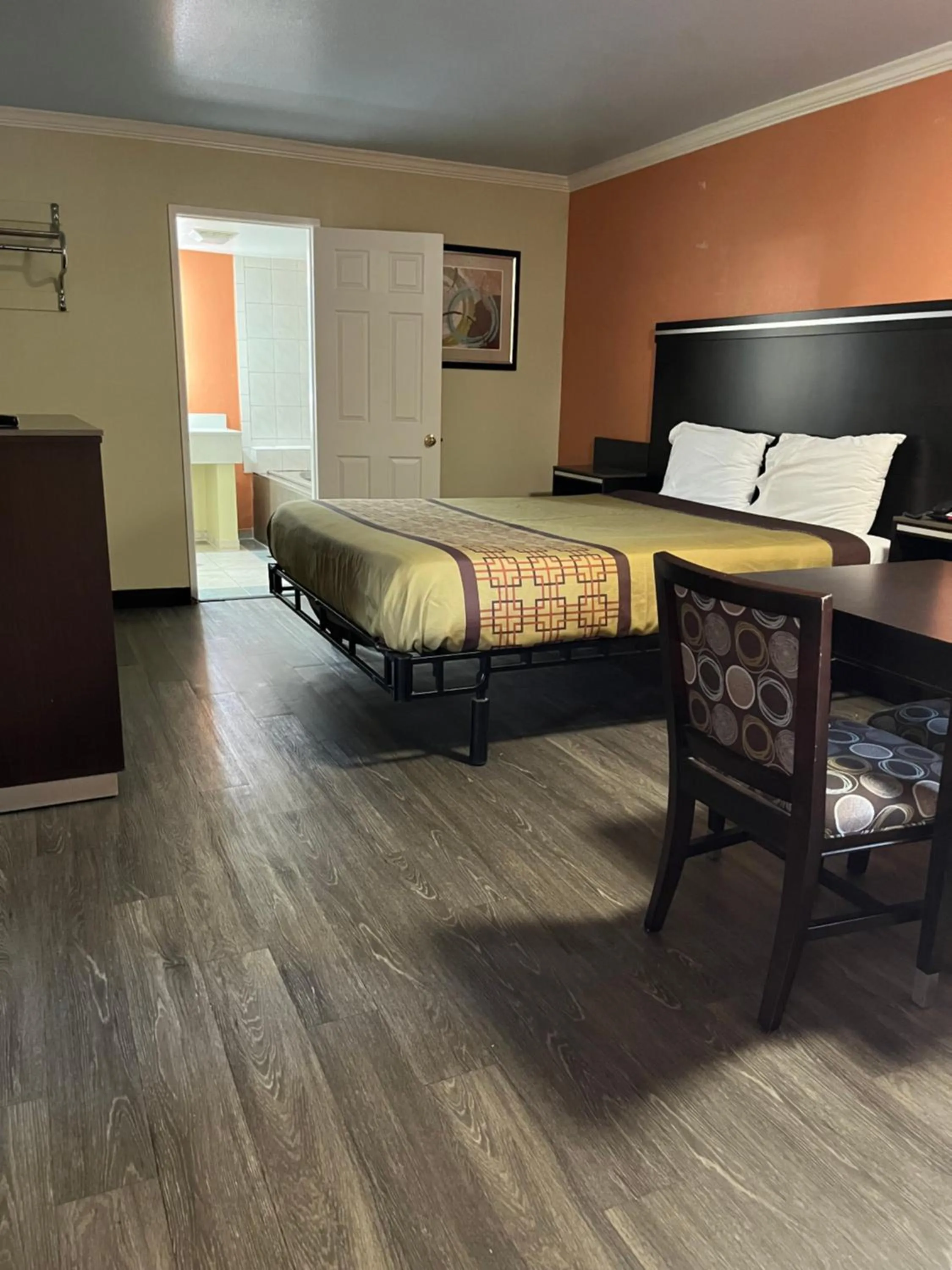 Bed in Rivera Inn & Suites Motel