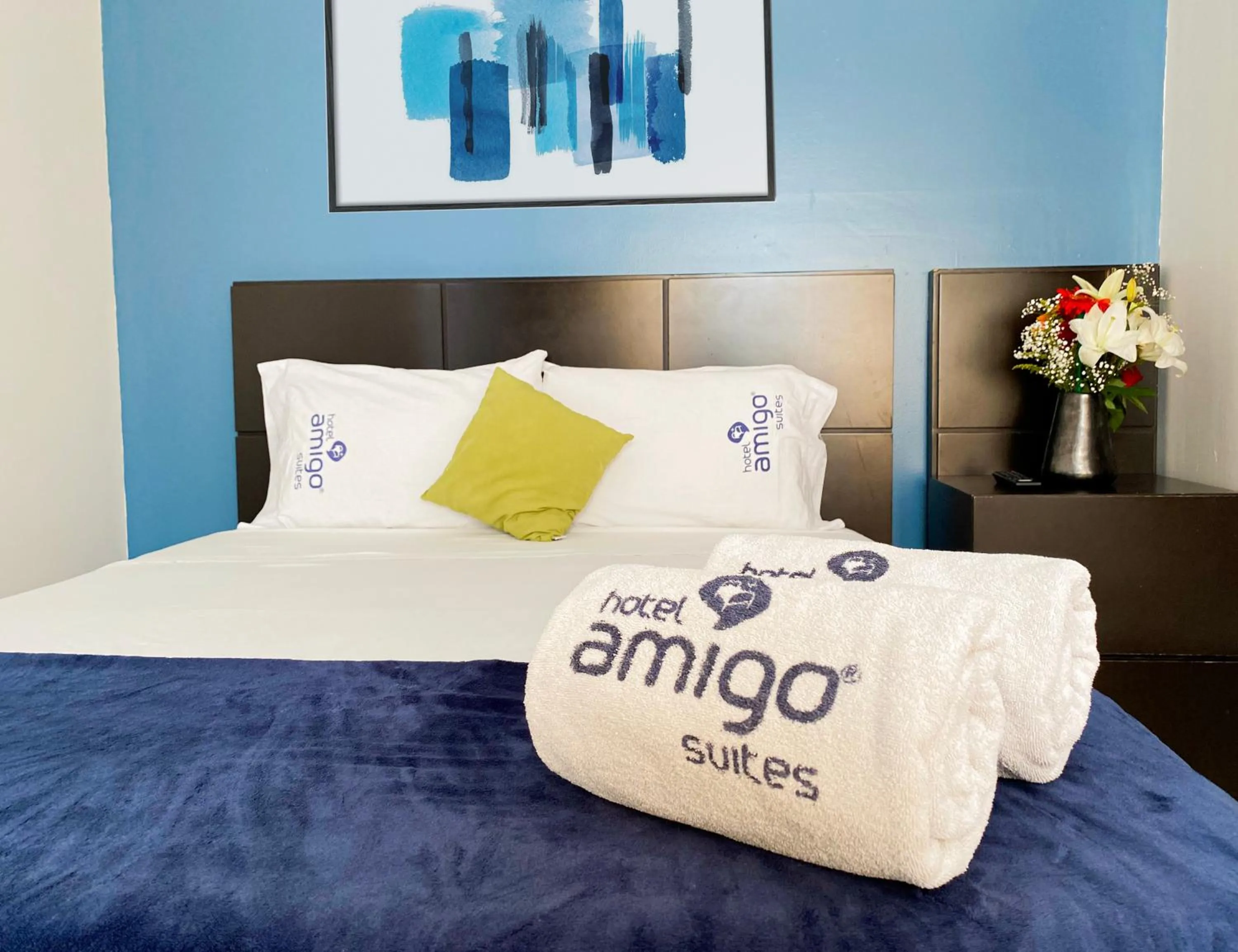 Bed in Hotel Amigo Suites