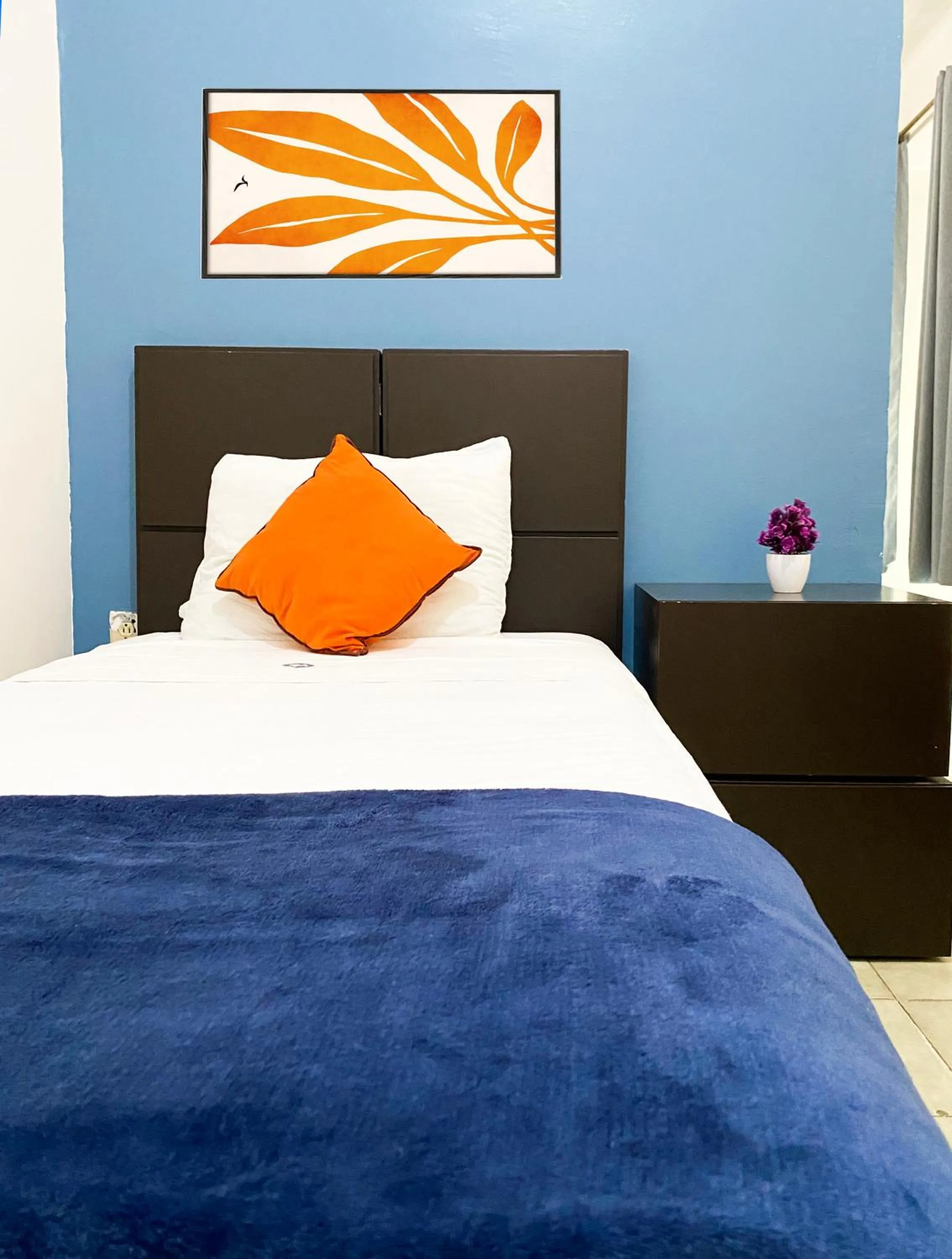 Bed in Hotel Amigo Suites