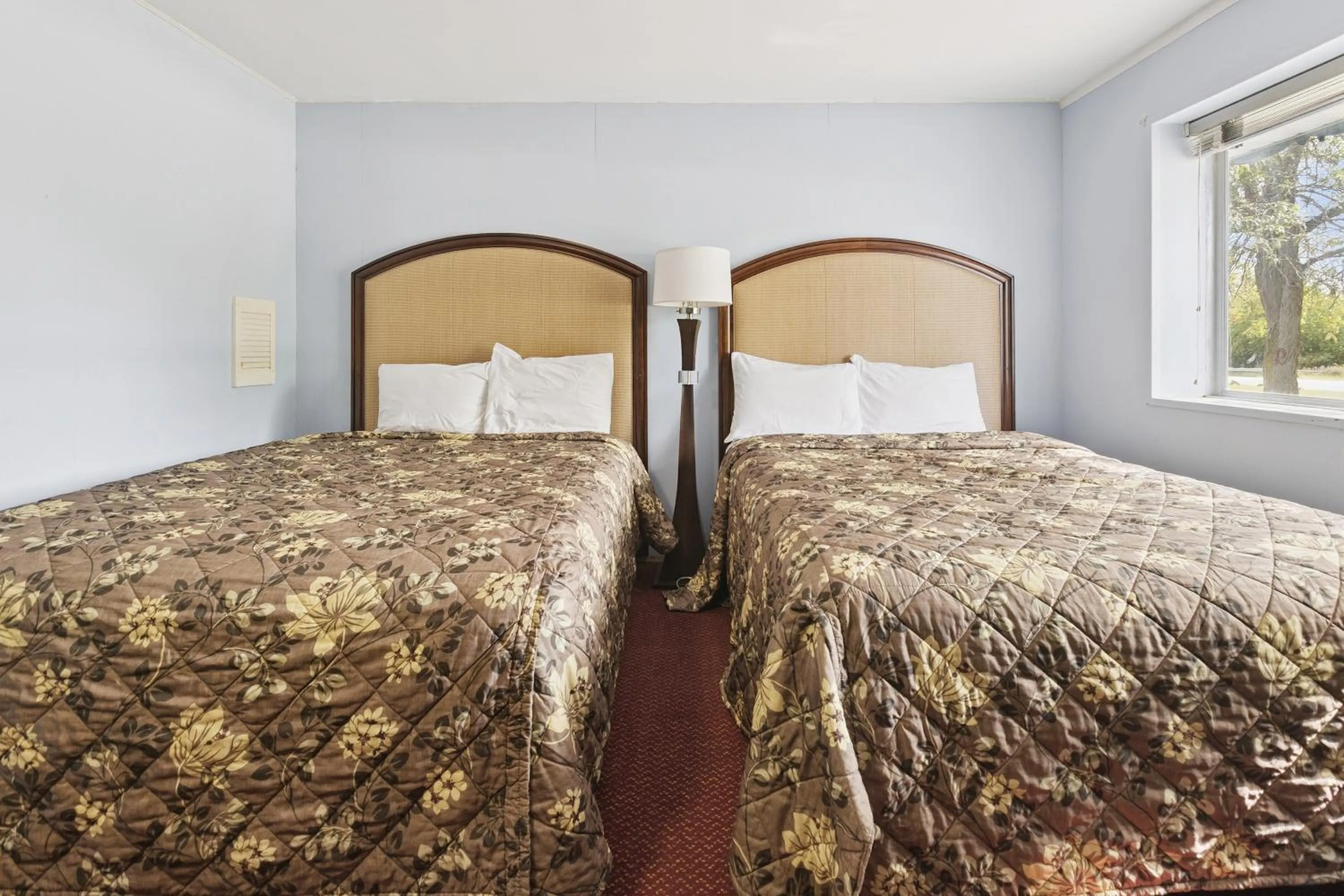 Bedroom, Bed in Heidelberg Motel by Capital O Bridgeport Frankenmuth I 75