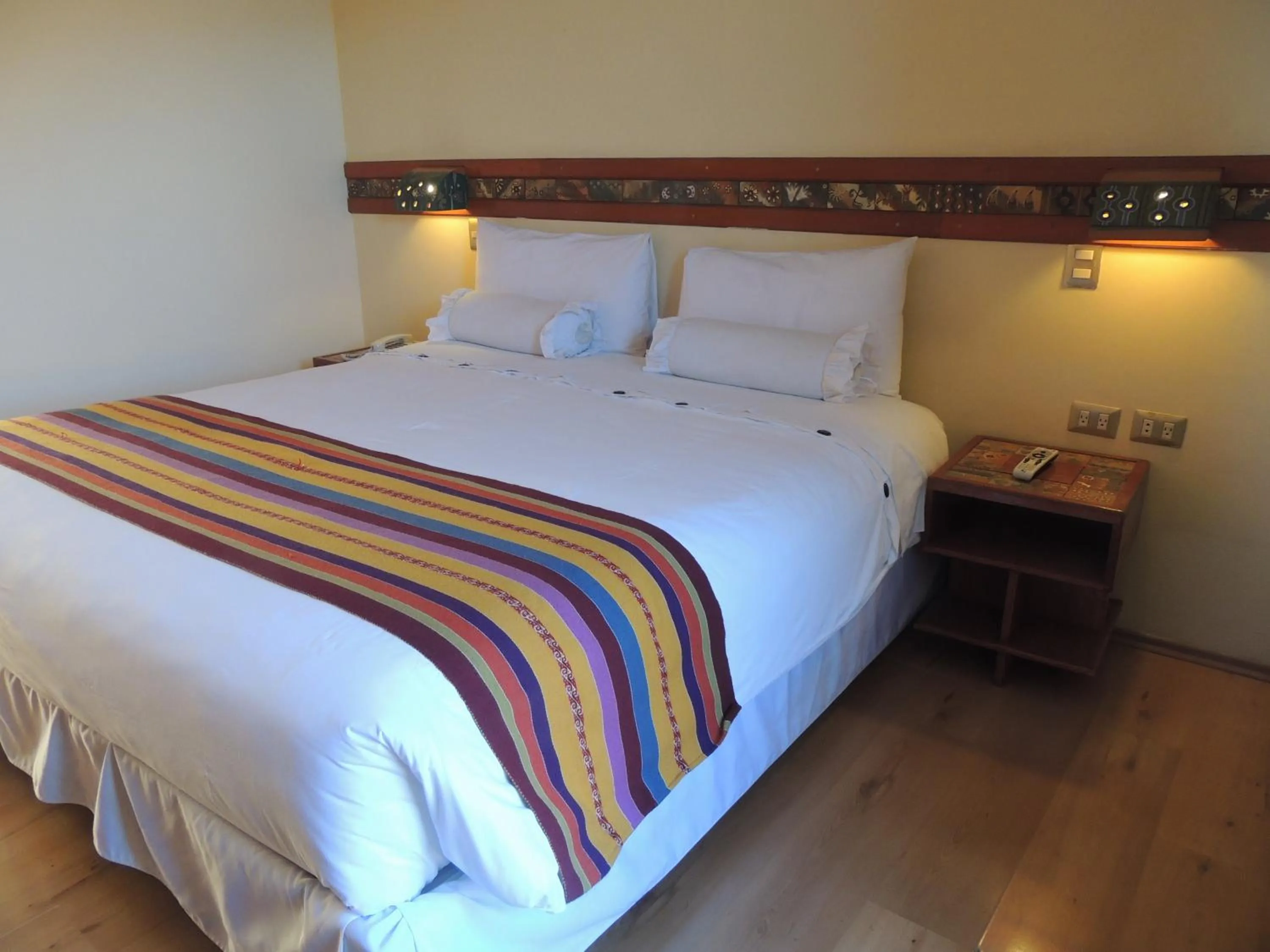 Bed in Taypikala Hotel Cusco