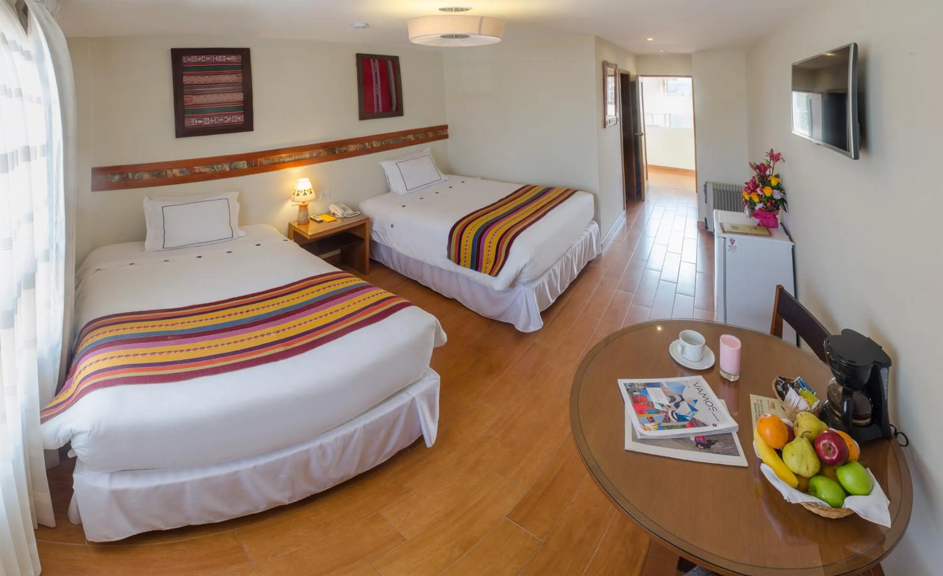 Bed in Taypikala Hotel Cusco