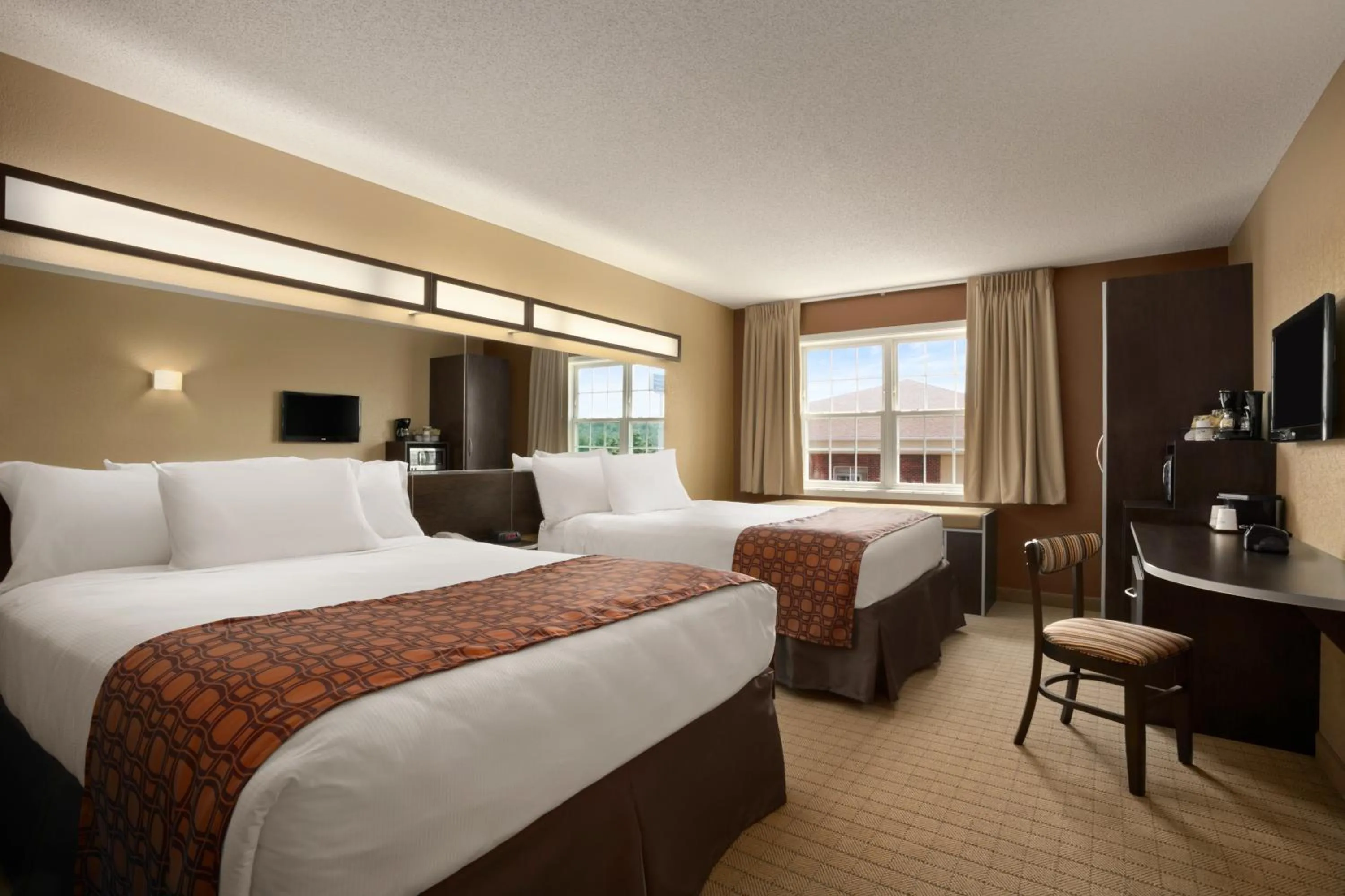 Bed in Microtel Inn & Suites By Wyndham Mineral Wells/Parkersburg