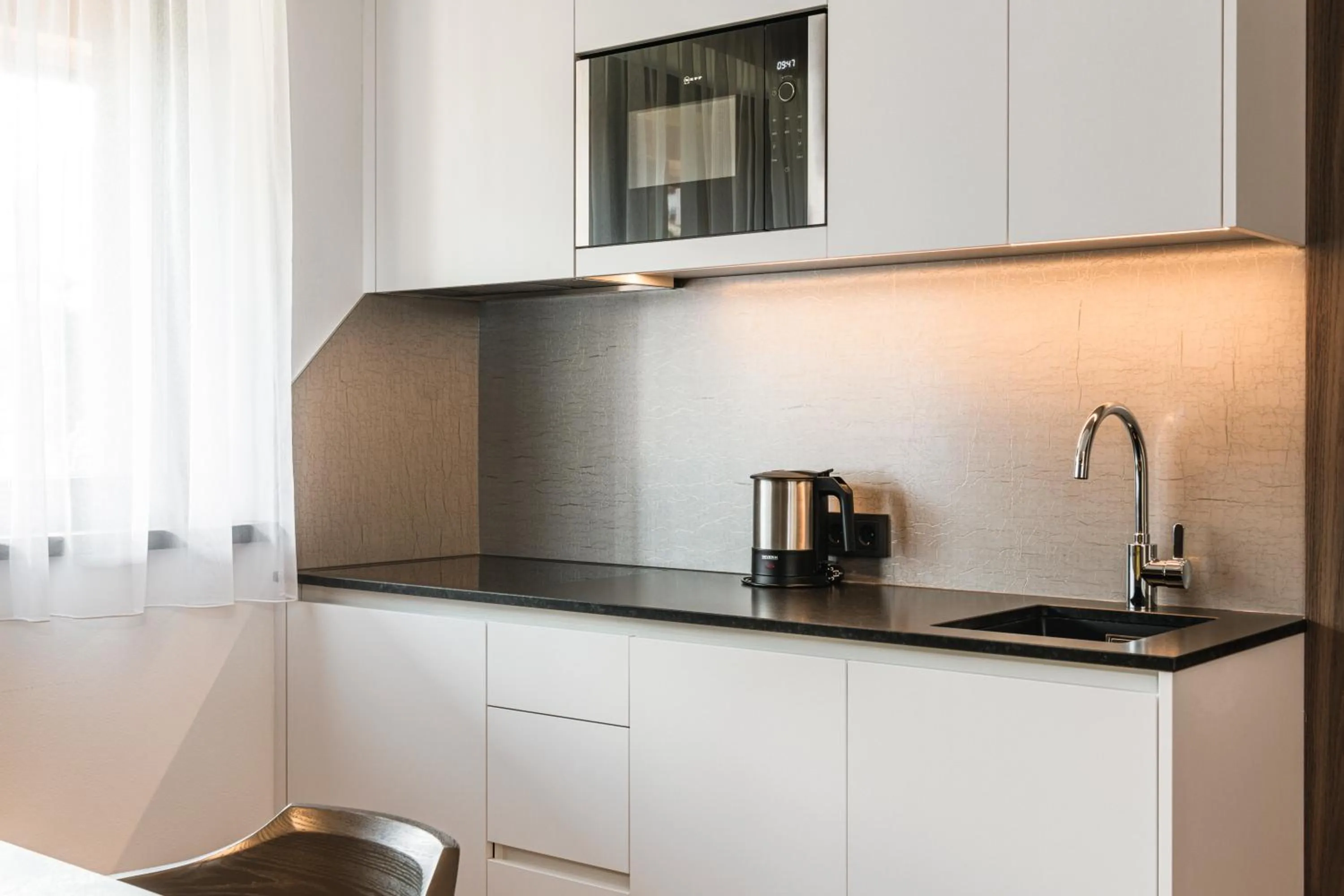 Kitchen or kitchenette in Boutique Hotel Planlim