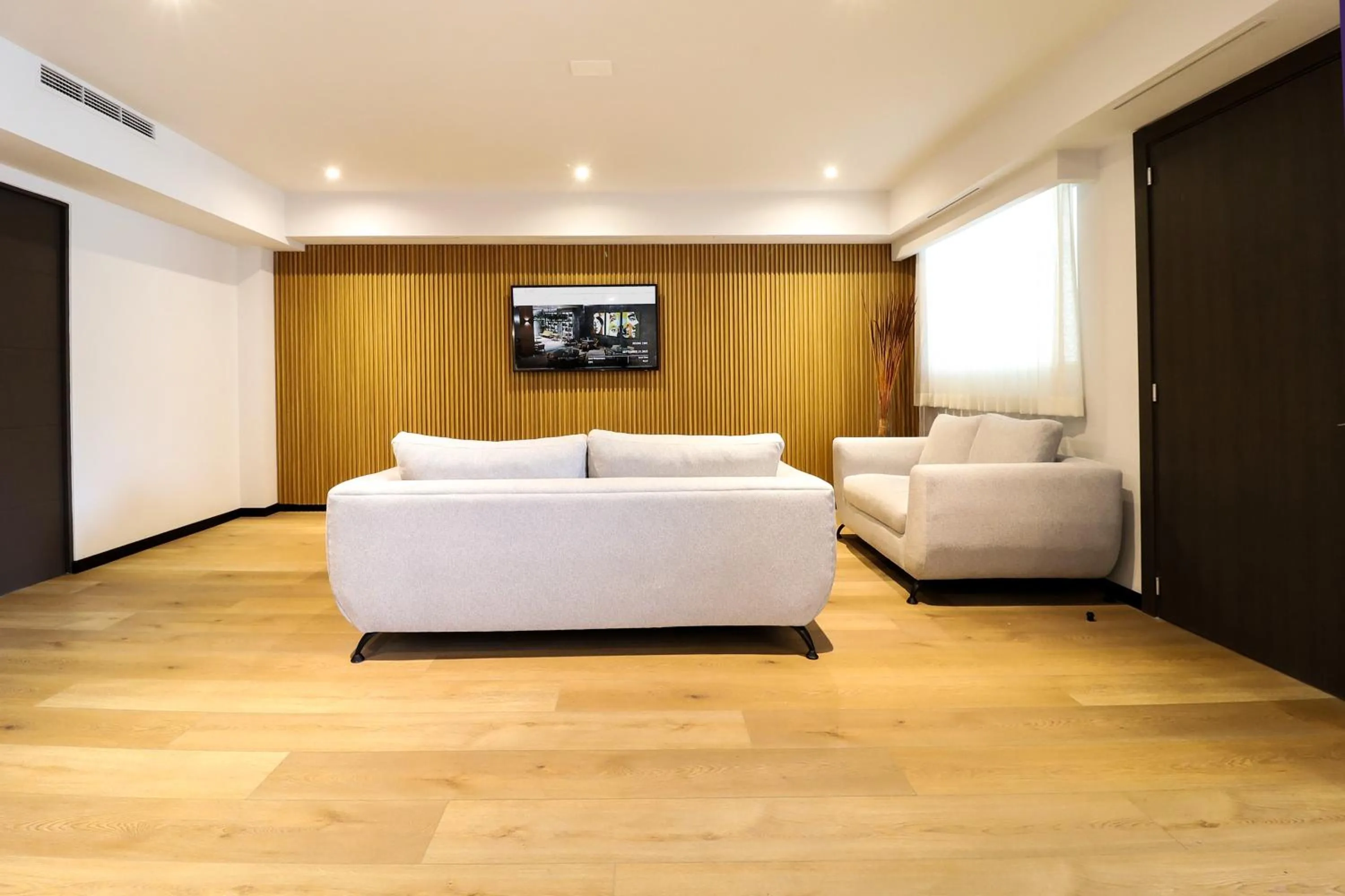 Living room in St Isidro Suites Corporate Housing SPA & Wellness Center