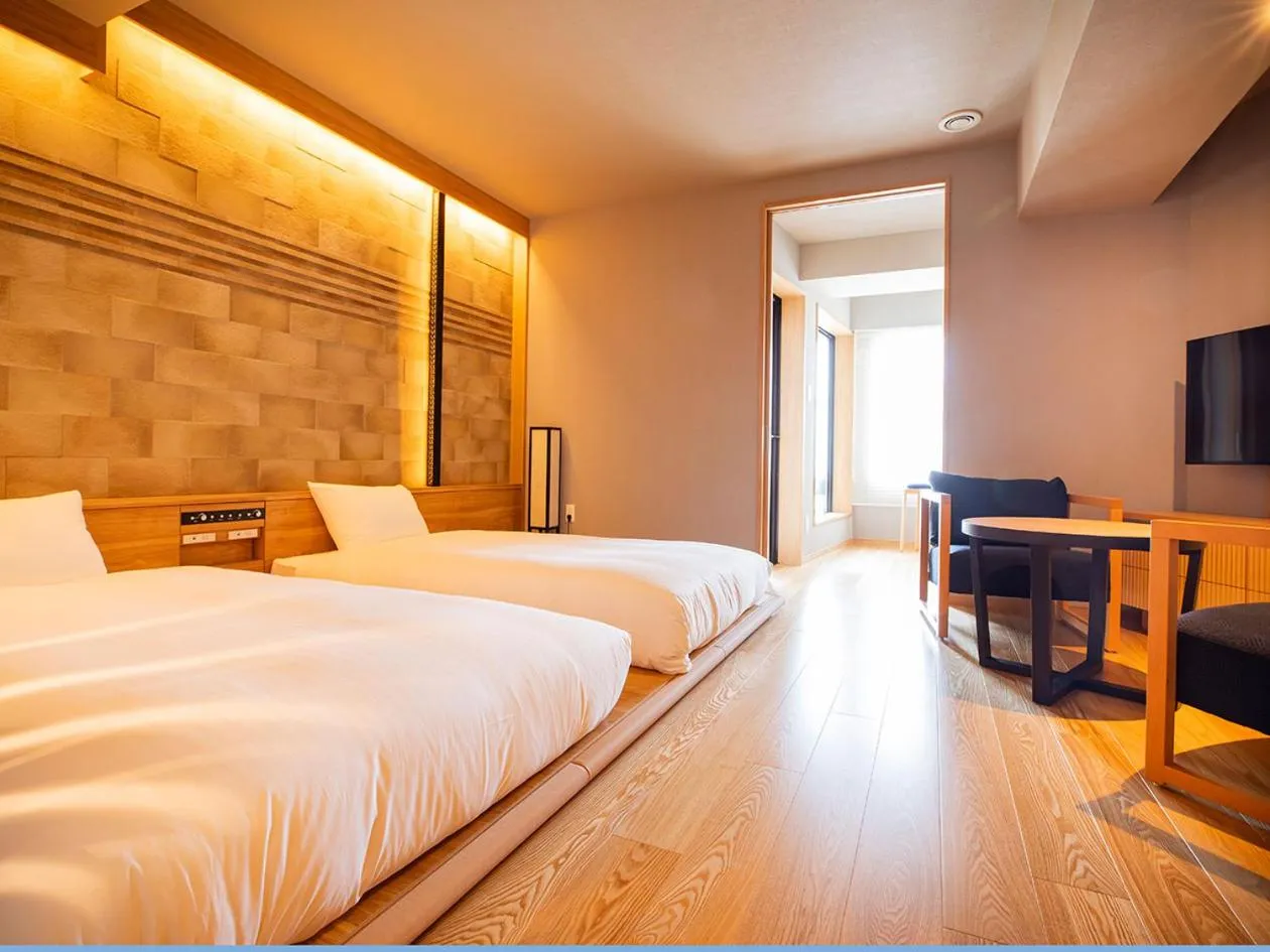 Bed in Yunokawa Prince Hotel Nagisatei